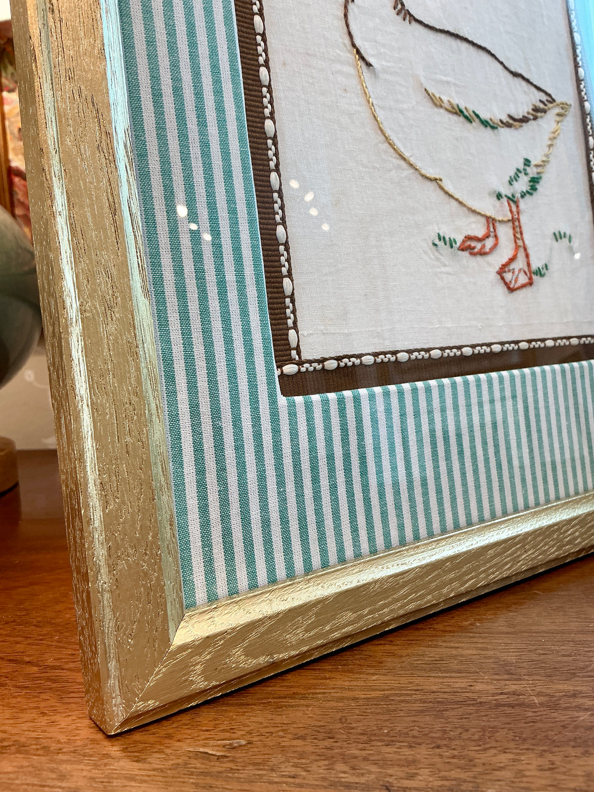 Early 20th Century Duck Redwork Embroidery on Green Stripes in Gold Frame