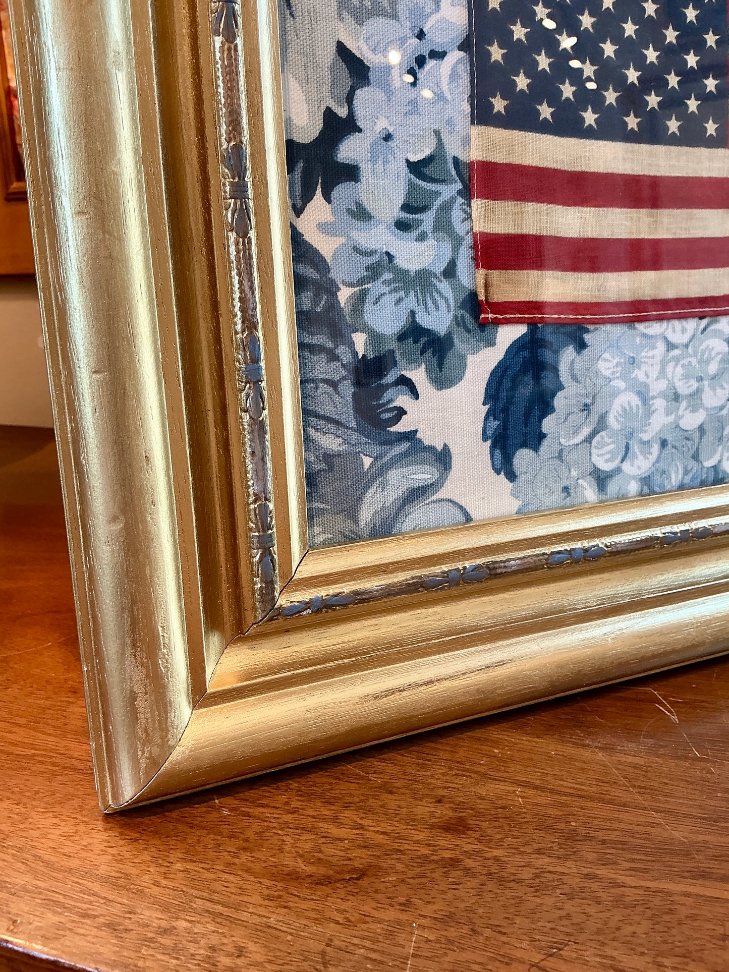 Vintage 50 Star American Flag on Blue Hydrangea Vintage Designer Fabric in Gold Bow Frame