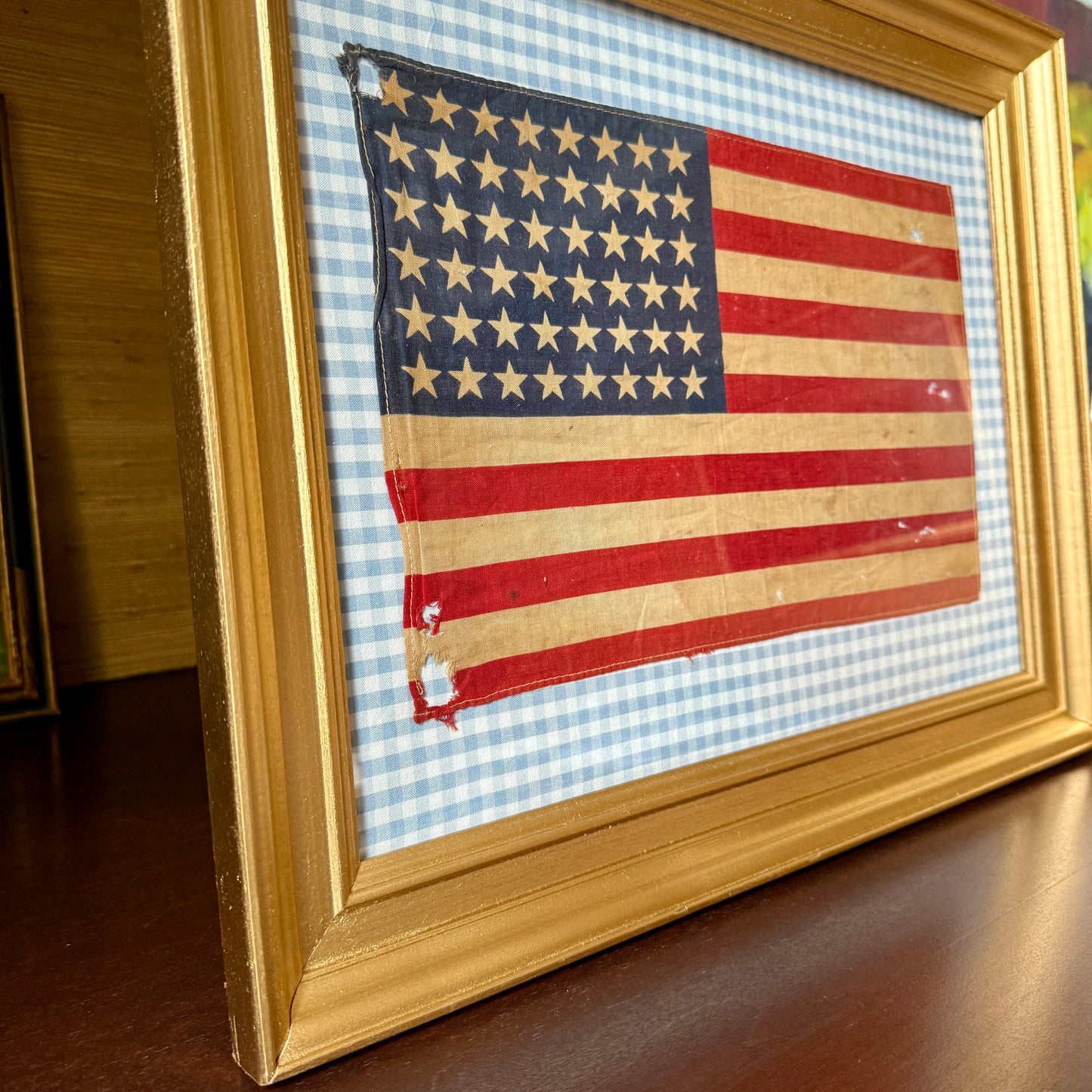 Vintage 48 Star American Flag on Light Blue Gingham Fabric in Gold Frame