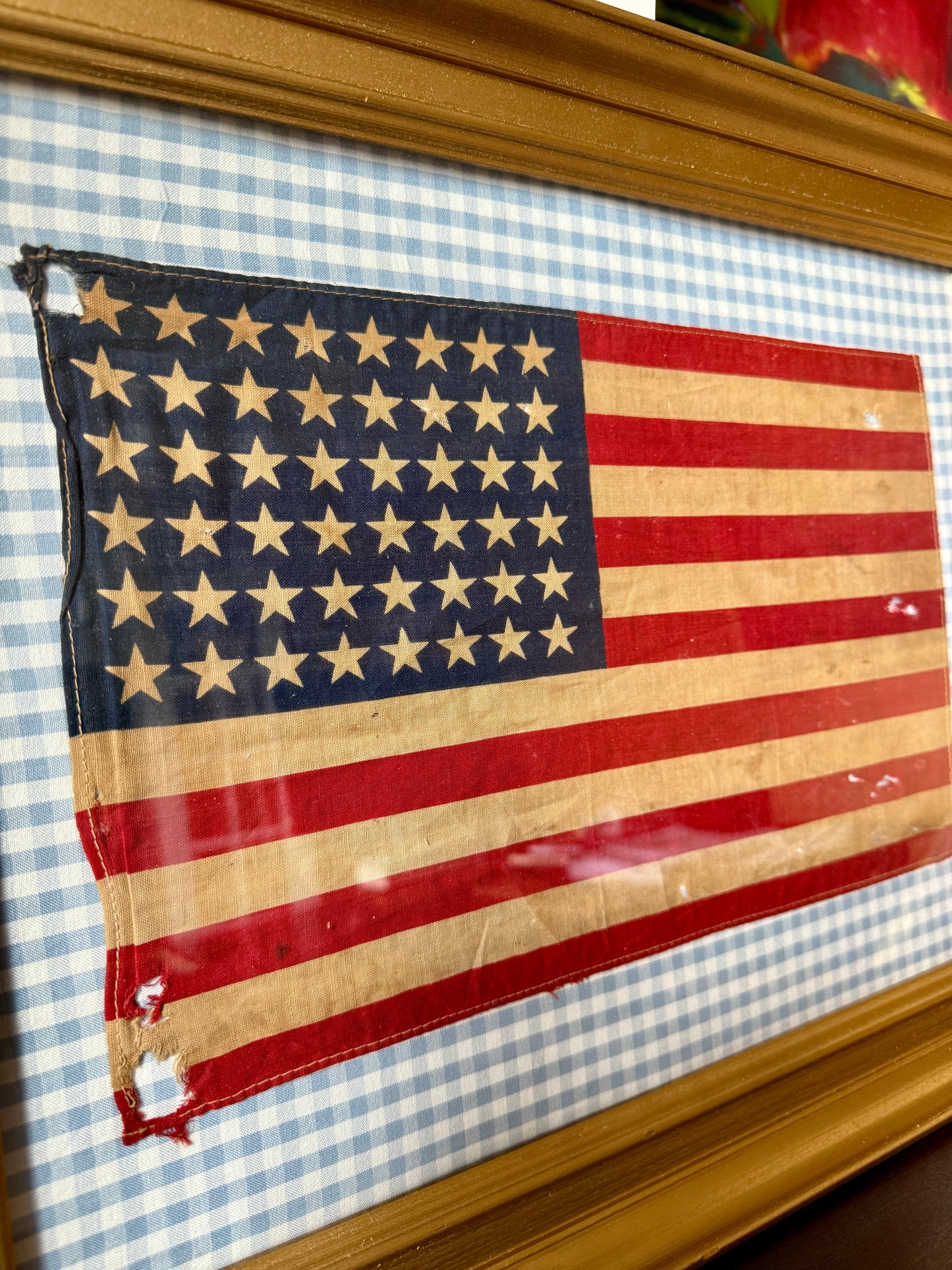 Vintage 48 Star American Flag on Light Blue Gingham Fabric in Gold Frame