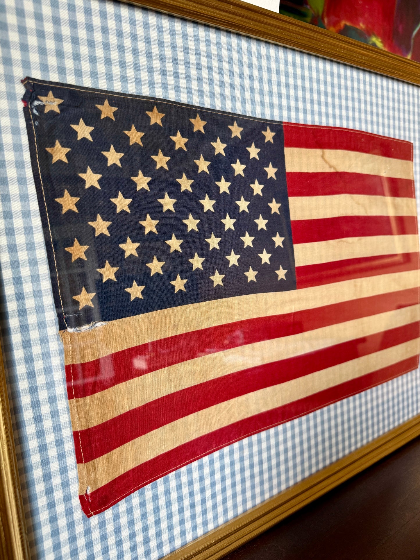Vintage 50 Staggered Star American Flag on Light Blue Gingham Fabric in Gold Frame