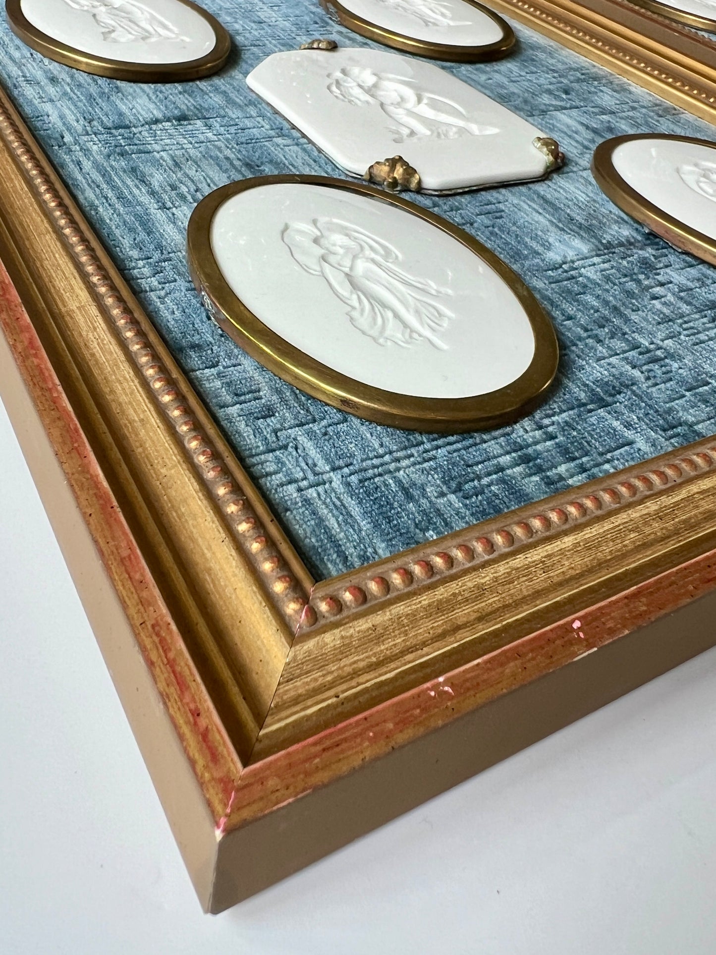 Pair of 10 Gold Wrapped Intaglios on Blue Velvet in Gold Frames