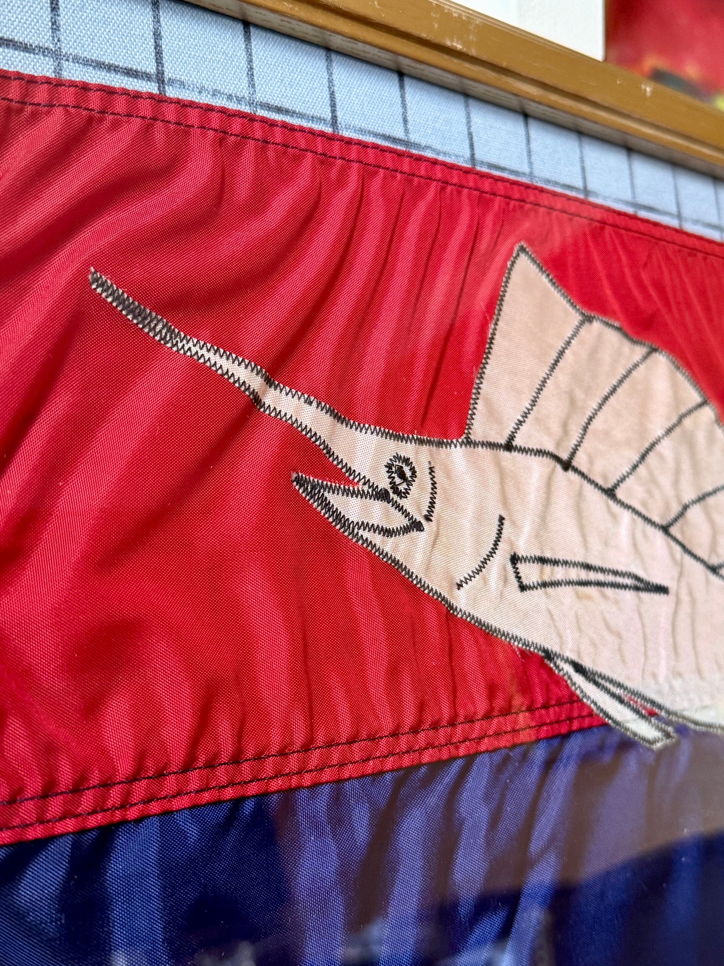 Vintage Sailfish Capture Trophy Flag on Blue Windowpane Check Fabric in Gold Frame