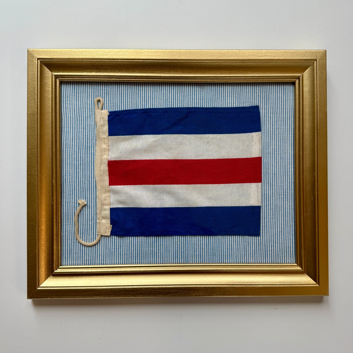 Vintage American Nautical "C" Signal Flag on Blue and White Oxford Striped Fabric in Gold Frame