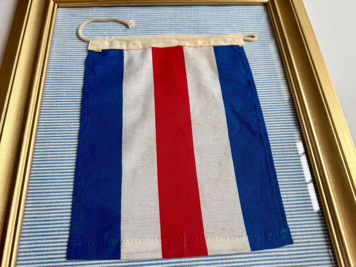 Vintage American Nautical "C" Signal Flag on Blue and White Oxford Striped Fabric in Gold Frame