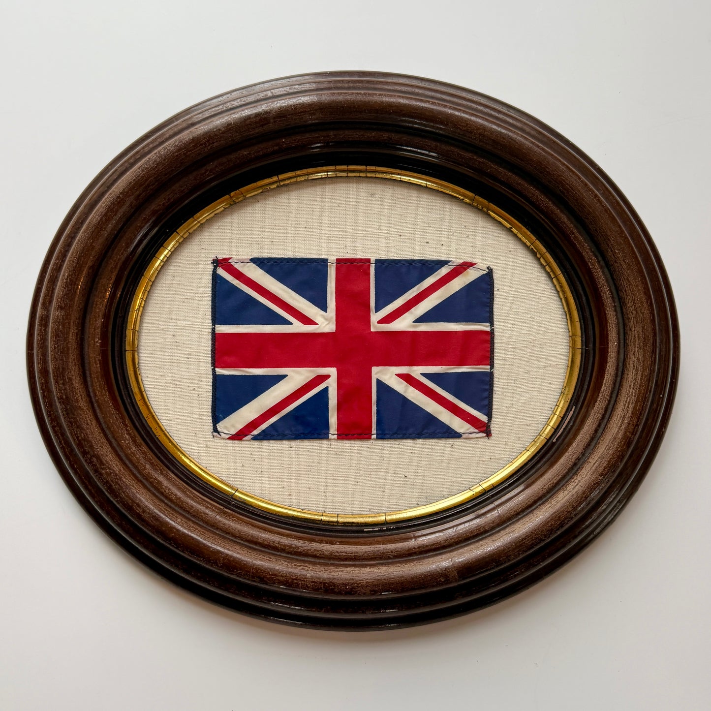 Vintage Union Jack British Parade Flag on Duck Cloth in Antique Oval Wood Frame