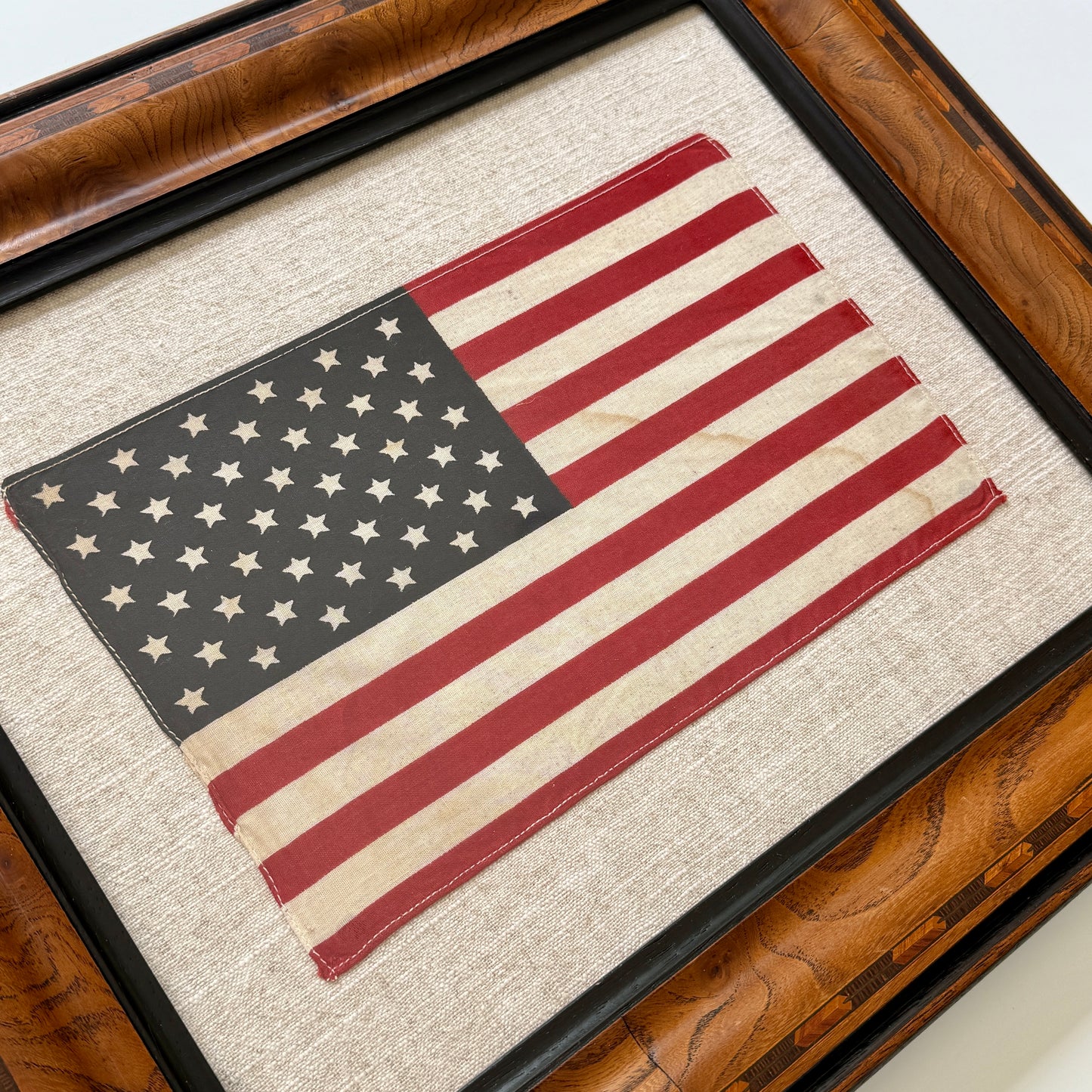 Vintage 50 Star American Flag on Natural Linen in Marquetry Wood Frame