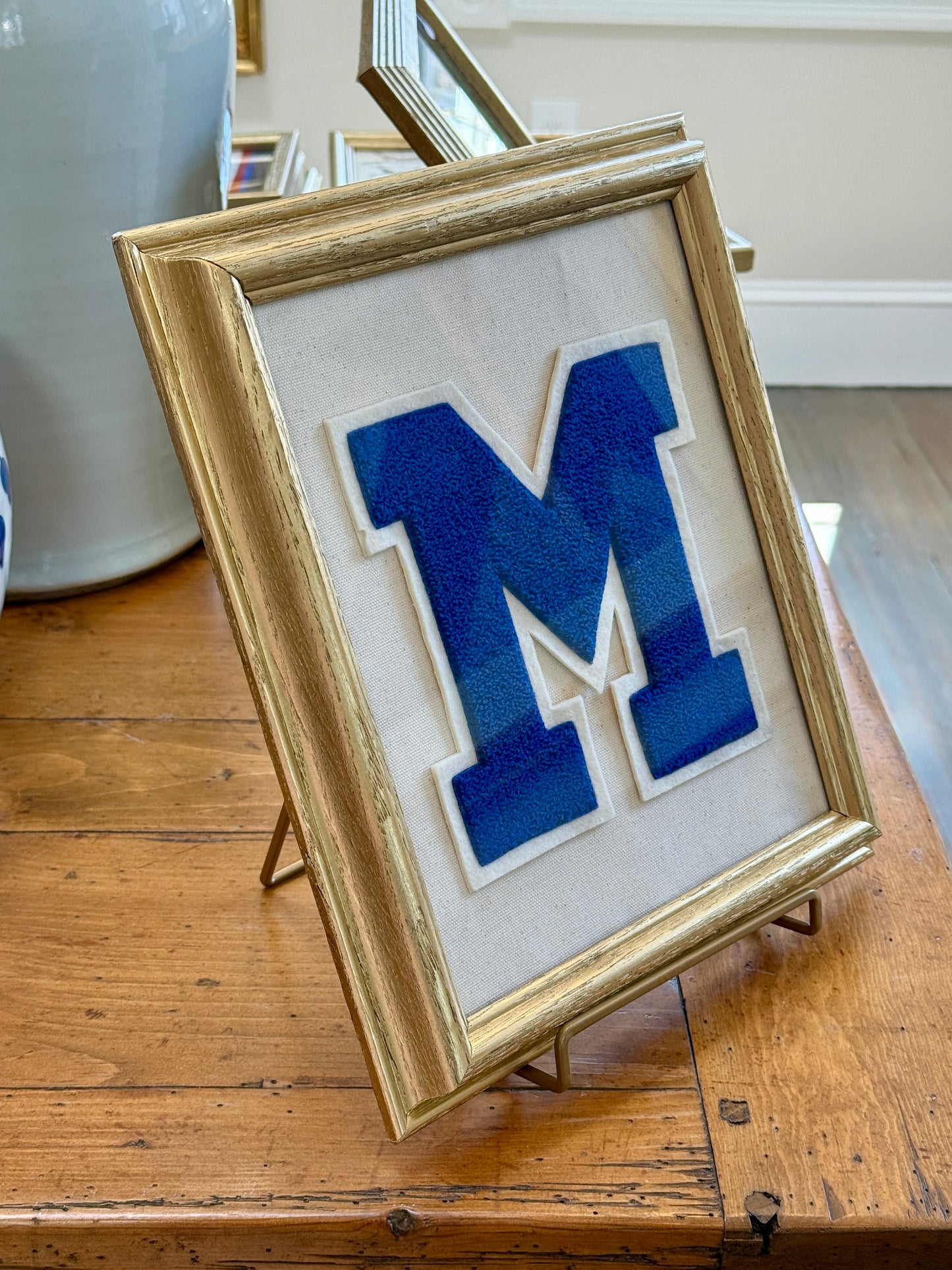 Vintage Blue and Ivory Varsity Letter Initial M on Ivory Duck Cloth in Gold Frame