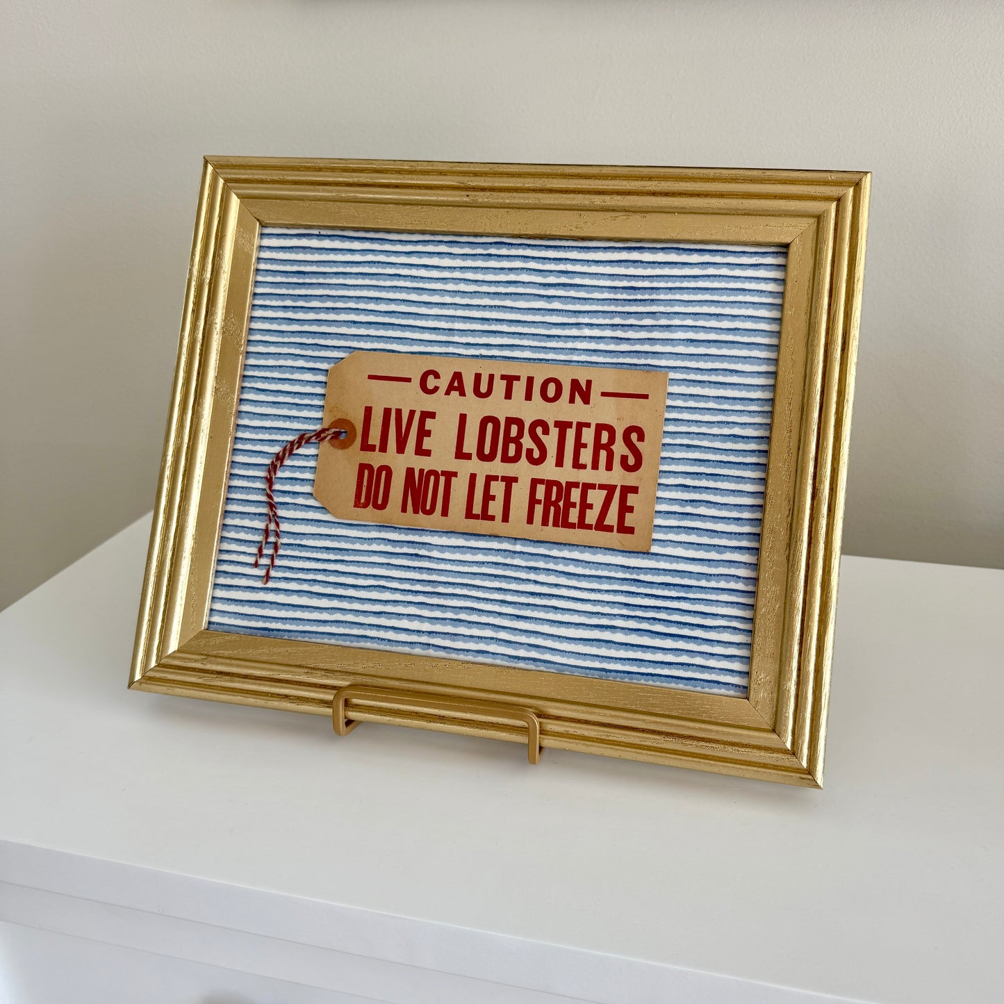 Vintage Maine Live Lobsters Tag on Blue Wavy Striped Fabric in Gold Frame
