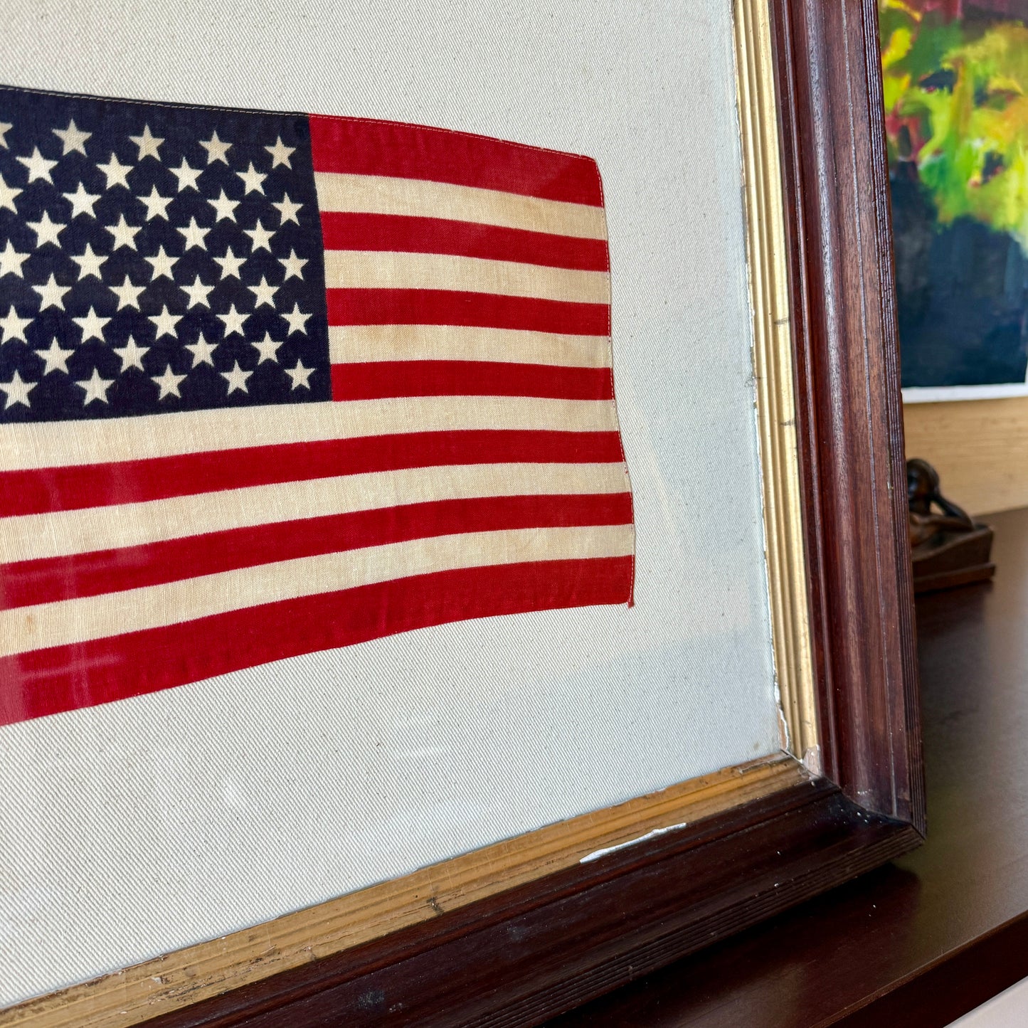 50 Staggered Star American Flag on Ivory Twill in Antique Wood and Gilded Frame