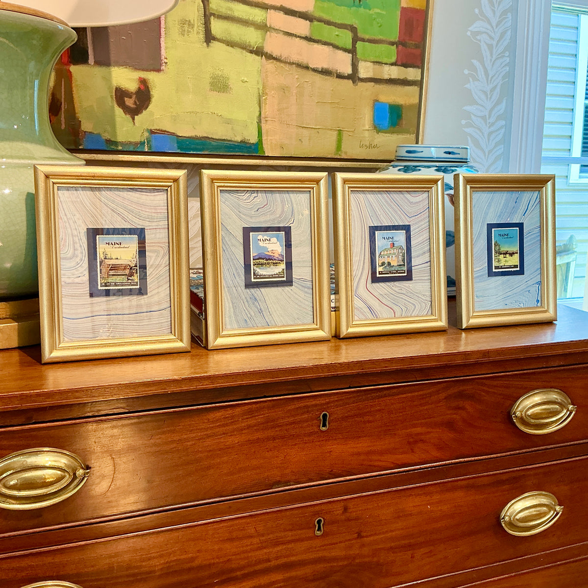Set of Four 1940 Maine "Vacationland" Stamps on Blue Marbled Mounting in Gold Frames - Set A