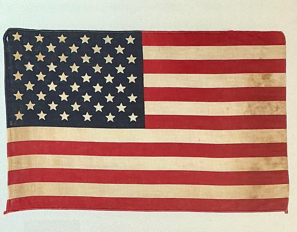 Vintage 50 Star American Flag on Ivory Duck Cloth in Burled Walnut Wood Frame
