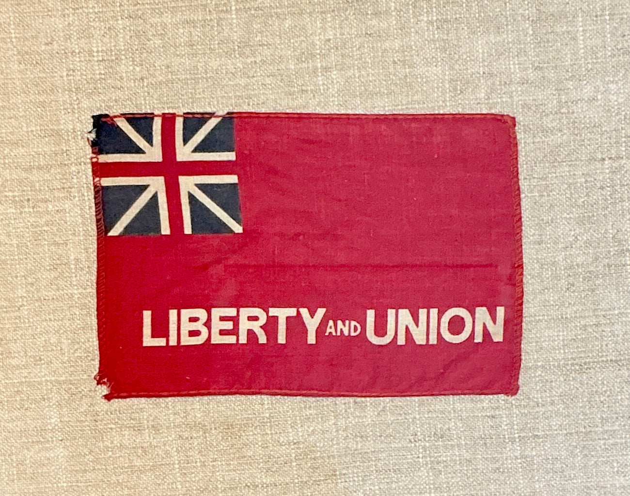 Vintage Taunton Flag on Light Grey Grain Sack Fabric in Wood Frame