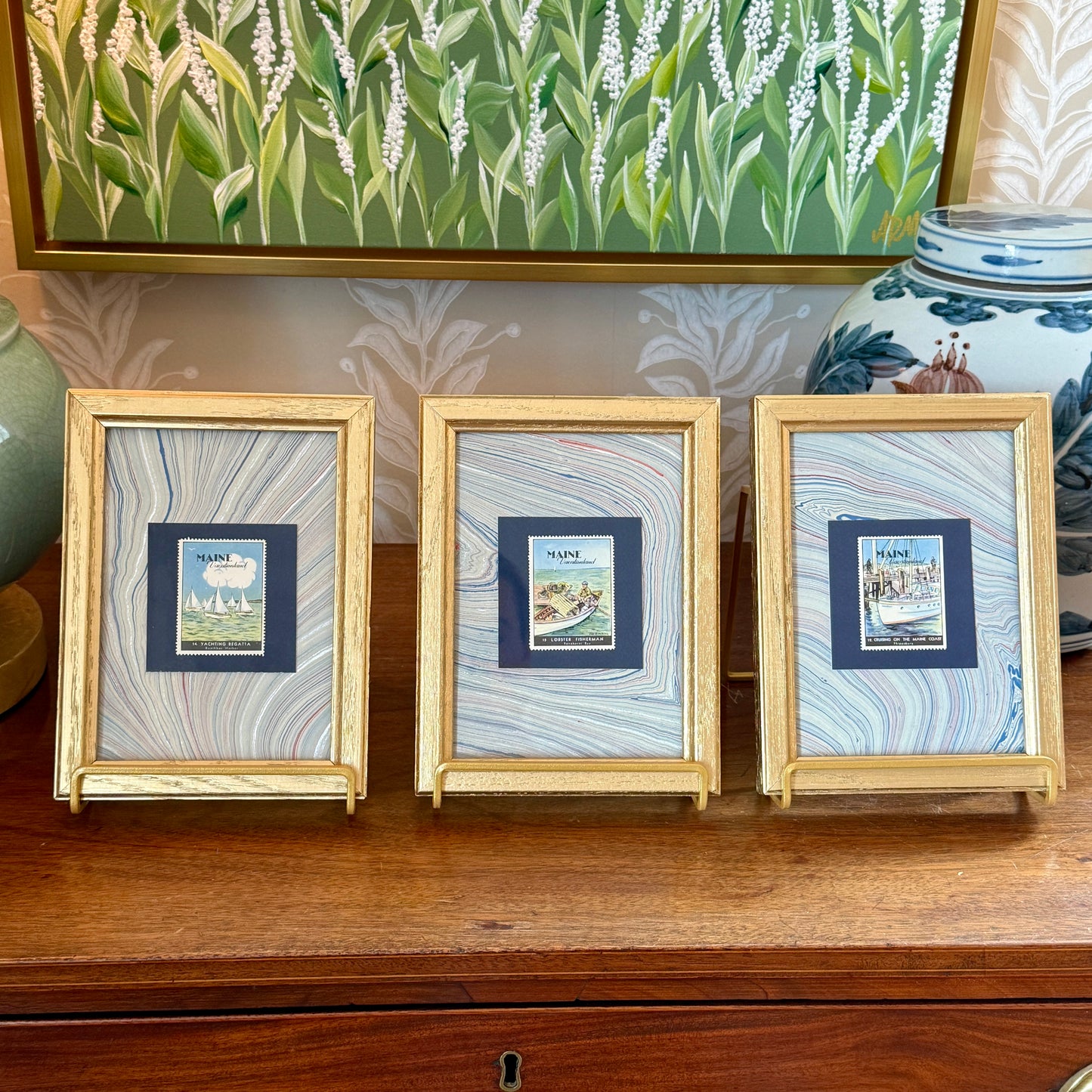 Set of Three 1940 Maine "Vacationland" Stamps on Blue Hand Marbled Paper in Gold Frames