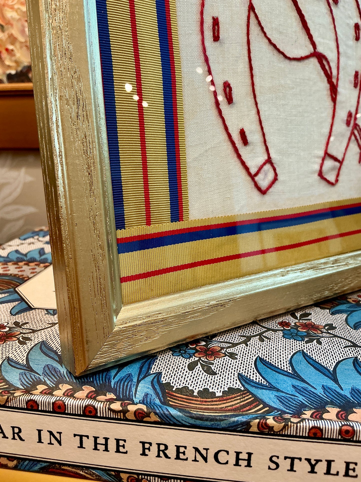 Antique Horse Shoe Redwork Embroidery with Gold and Blue Hat Band Ribbon in Gold Frame