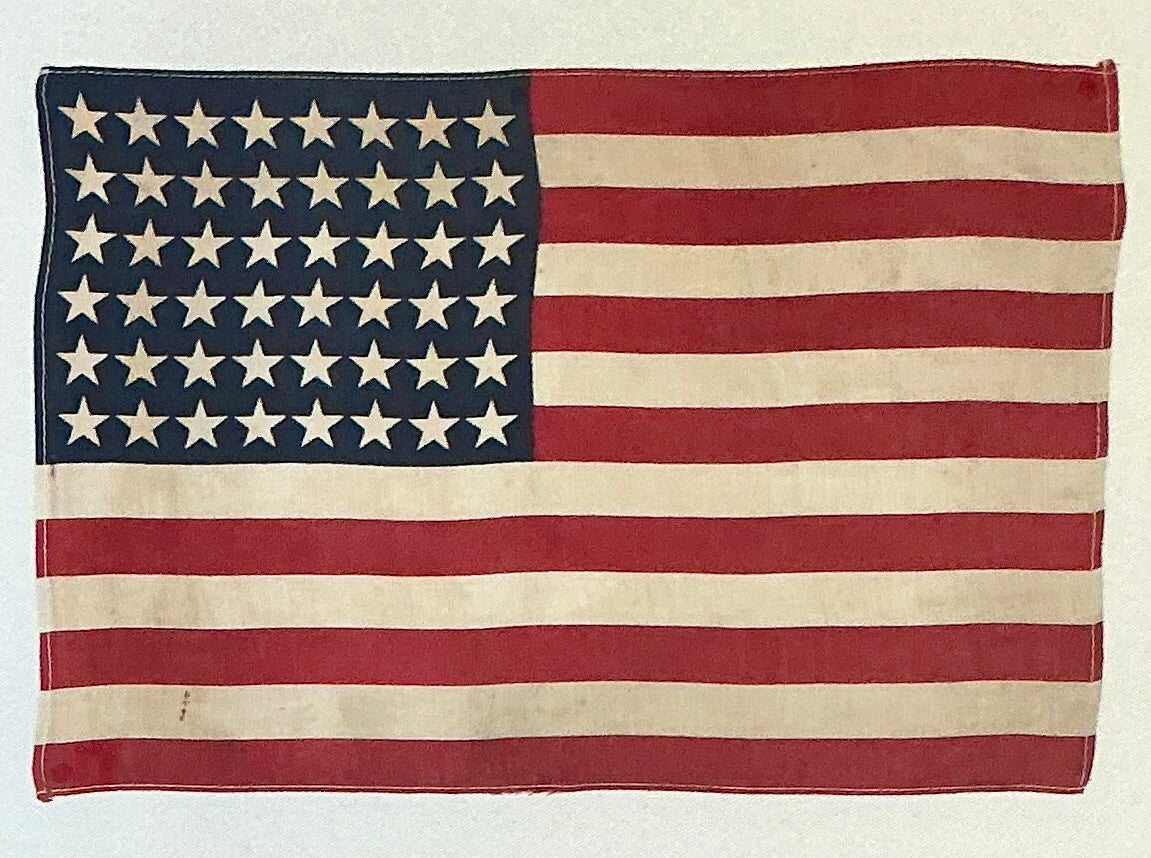 Vintage 48 Star American Flag on Ivory Duck Cloth in Antique Gold Wood Frame