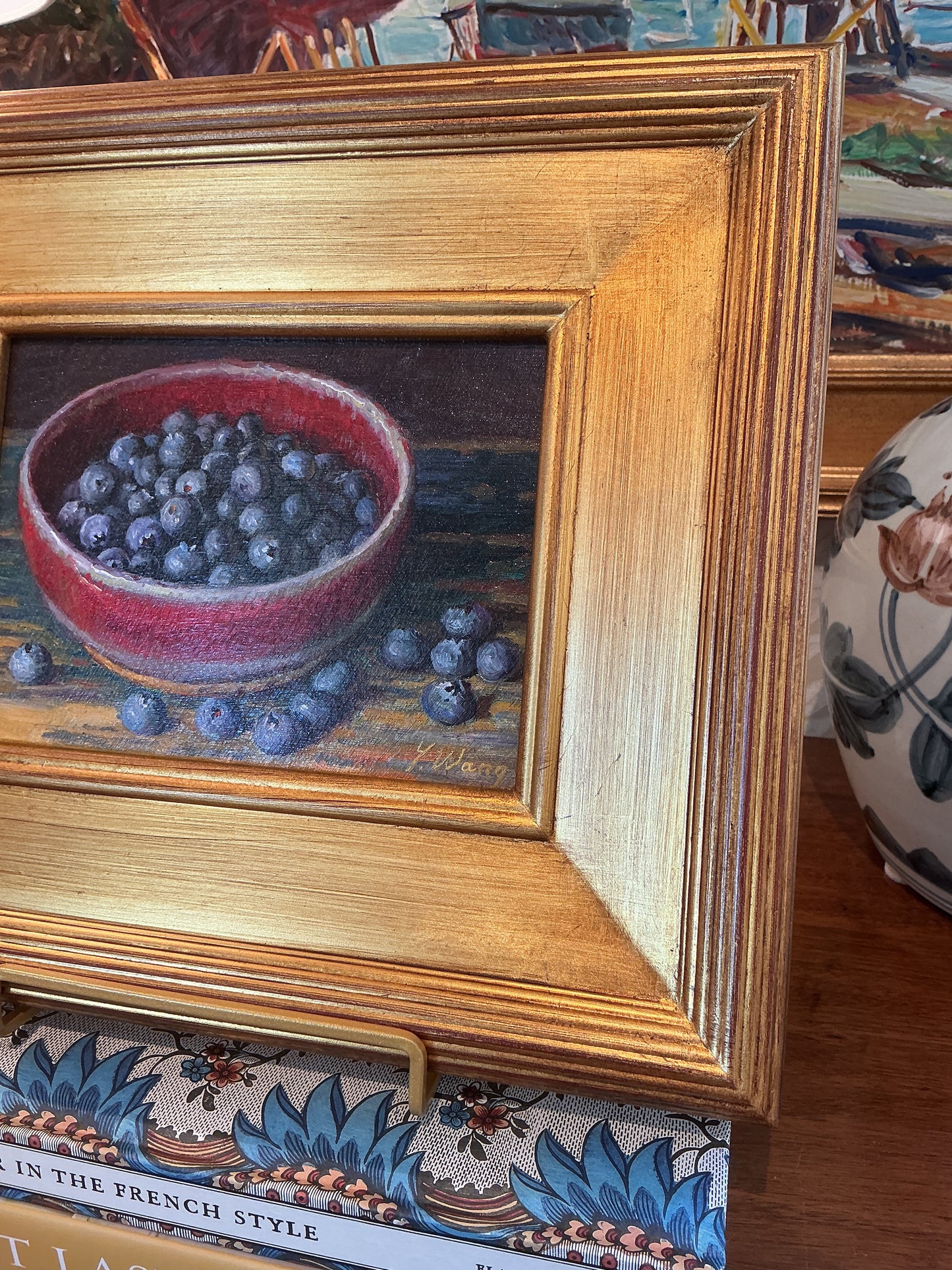 Youqing Wang Blueberries in Red Pottery Bowl on Blue Painted Table Still Life Oil Painting in Gold Frame