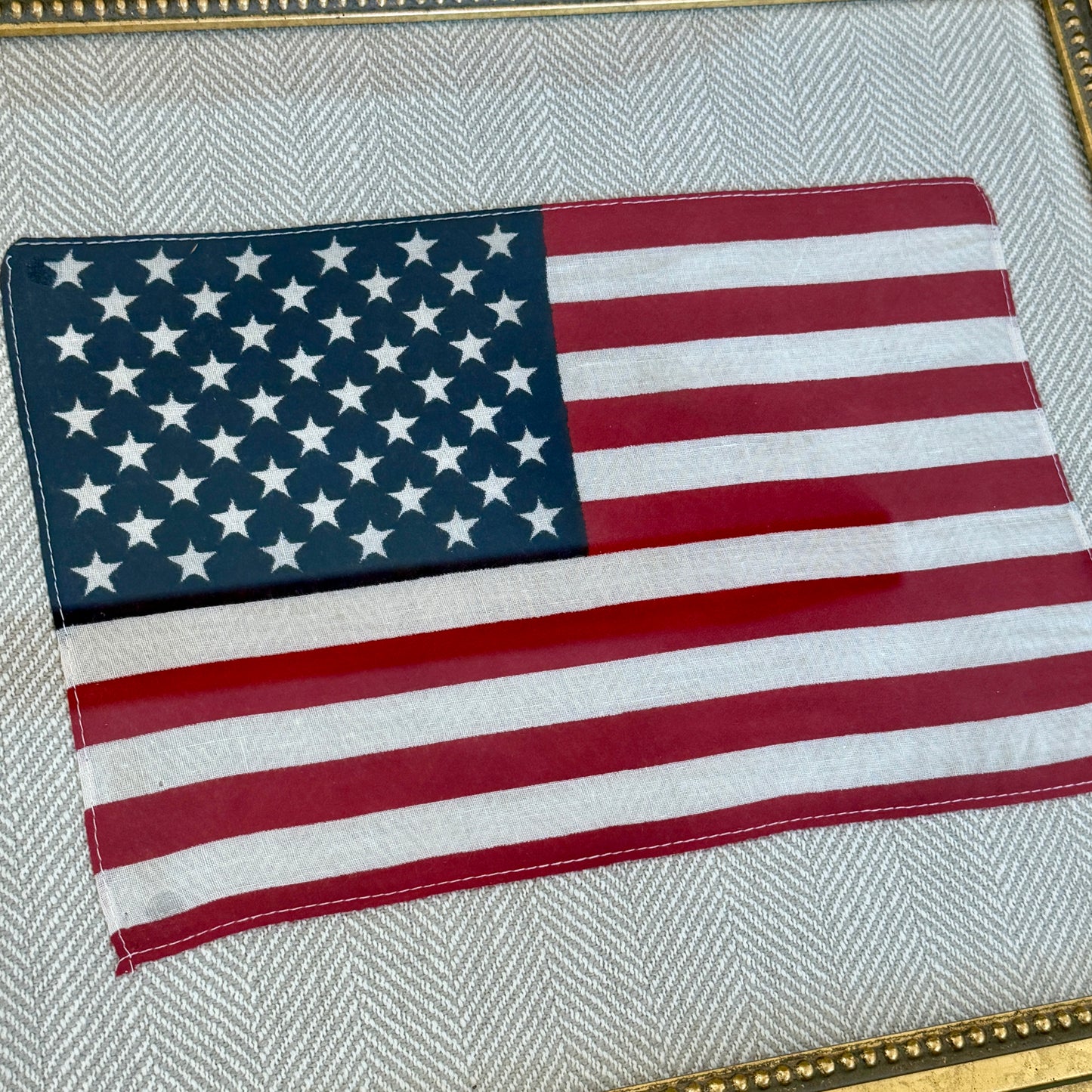 Vintage 50 Staggered Star American Flag on Neutral Heringbone Fabric in Gold Frame