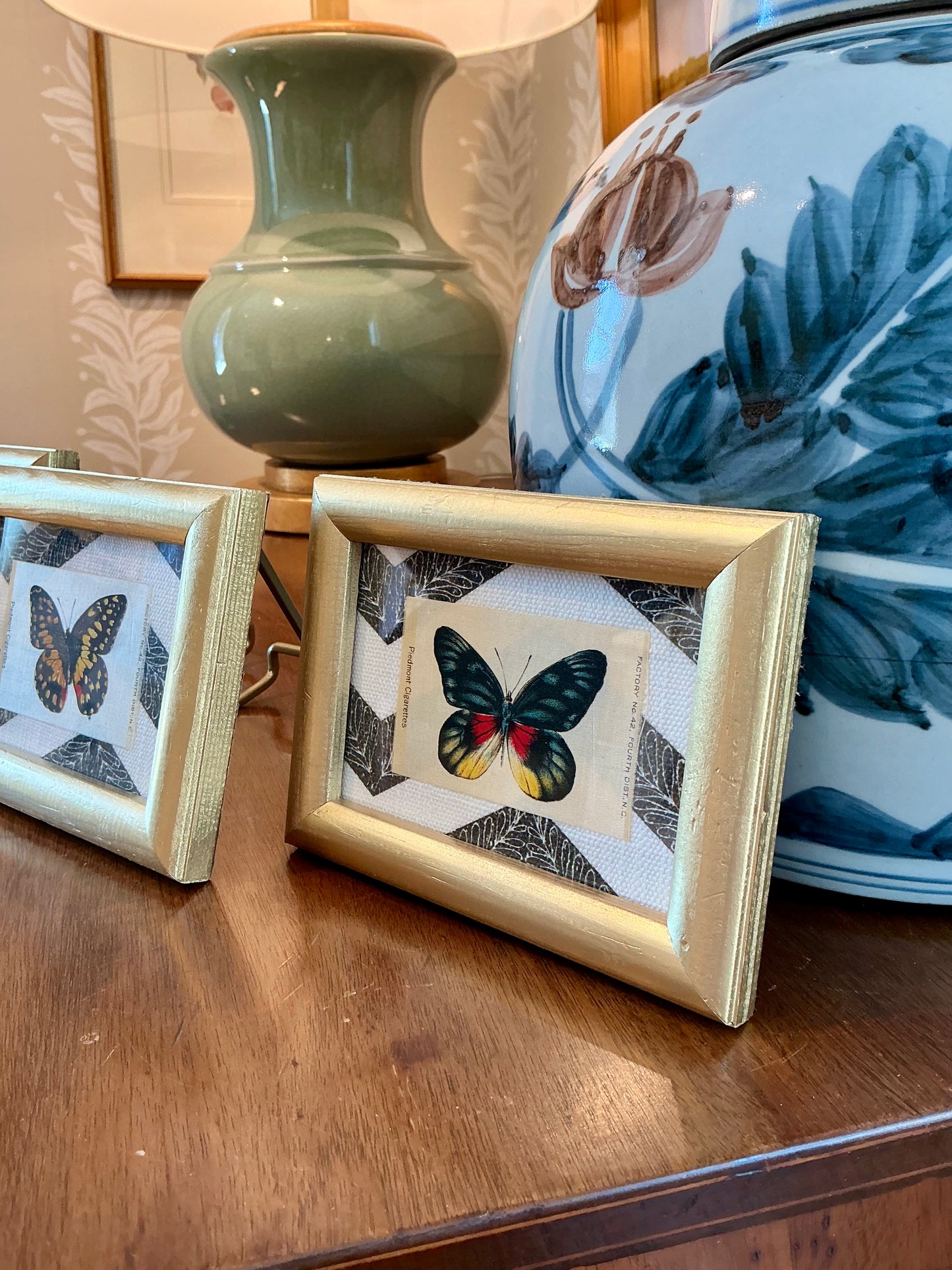 Set of Three Antique Butterfly Tobacco Silks on Black and White Zigzag in Gold Frames