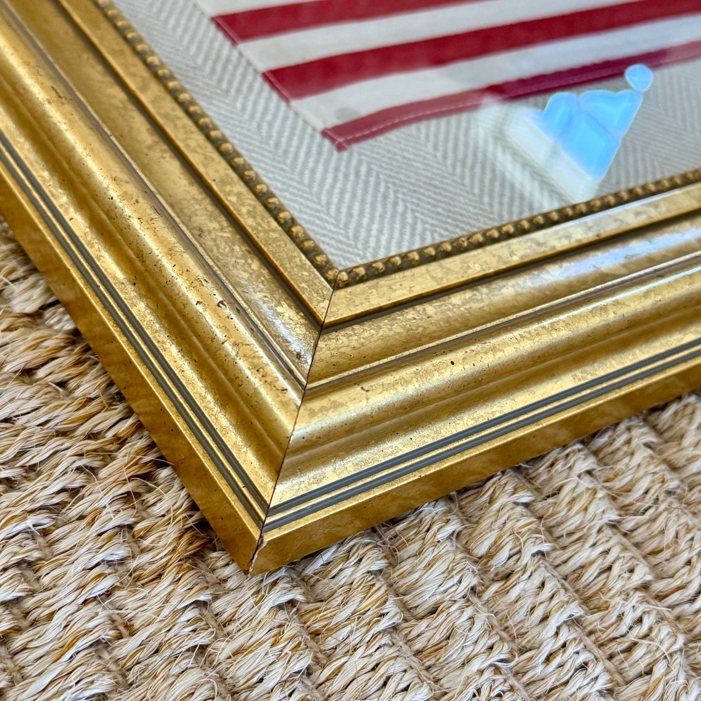 Vintage 50 Staggered Star American Flag on Neutral Heringbone Fabric in Gold Frame