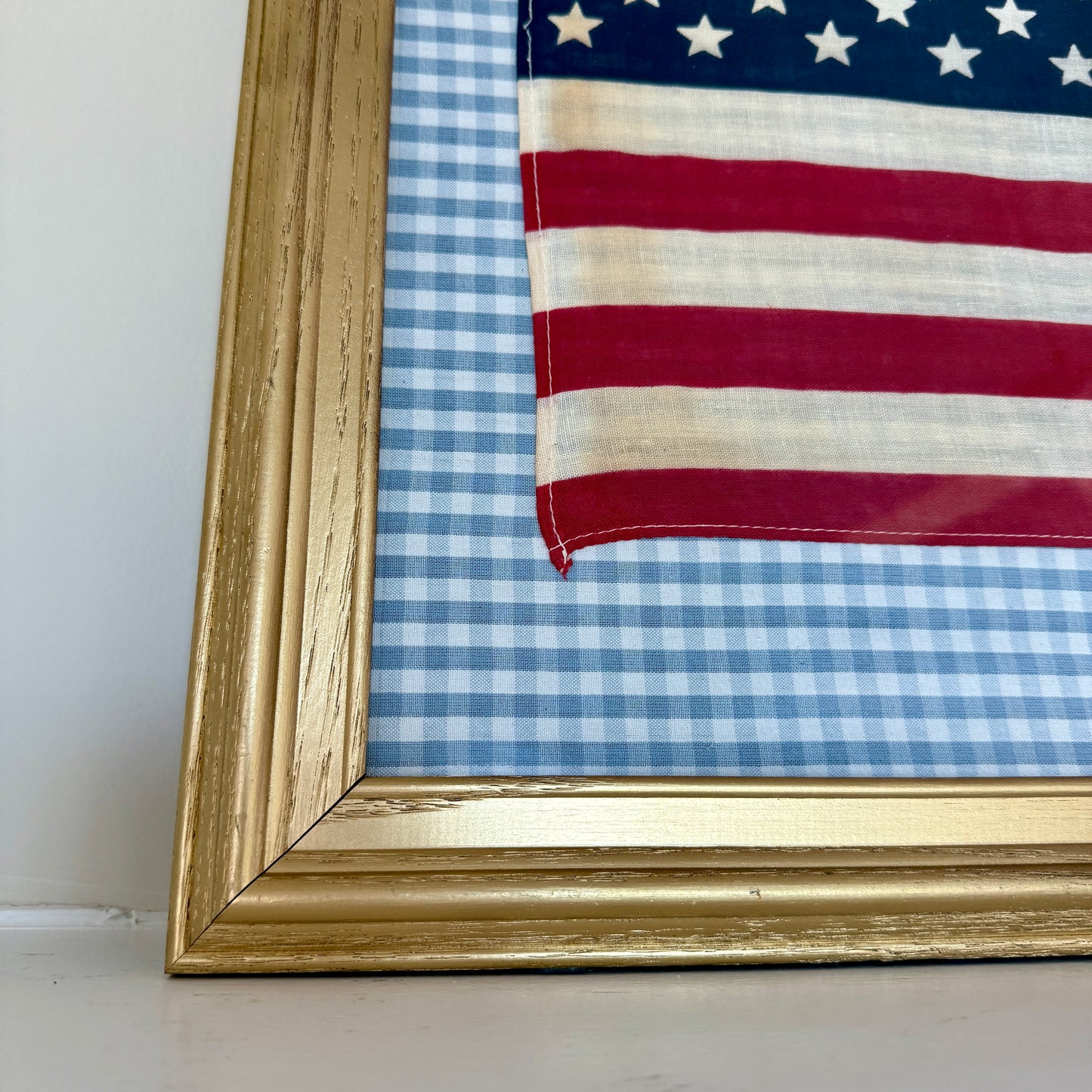 Vintage 50 Staggered Star American Flag on Light Blue Gingham Fabric in Gold Frame