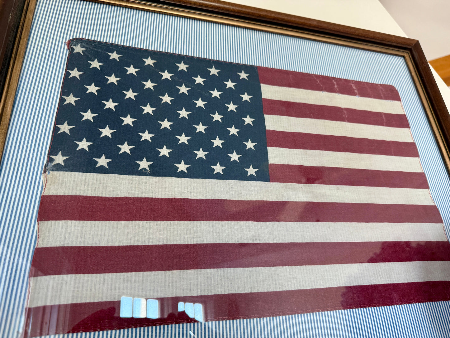 Vintage 50 Staggered Star American Flag on Blue Ticking Striped Fabric in Wood and Gold Frame