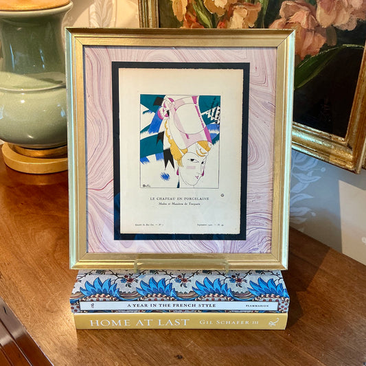 1920 Le Chapeau en Porcelaine (The Porcelain Hat) Pochoir Fashion Portrait Illustration in Gold Frame