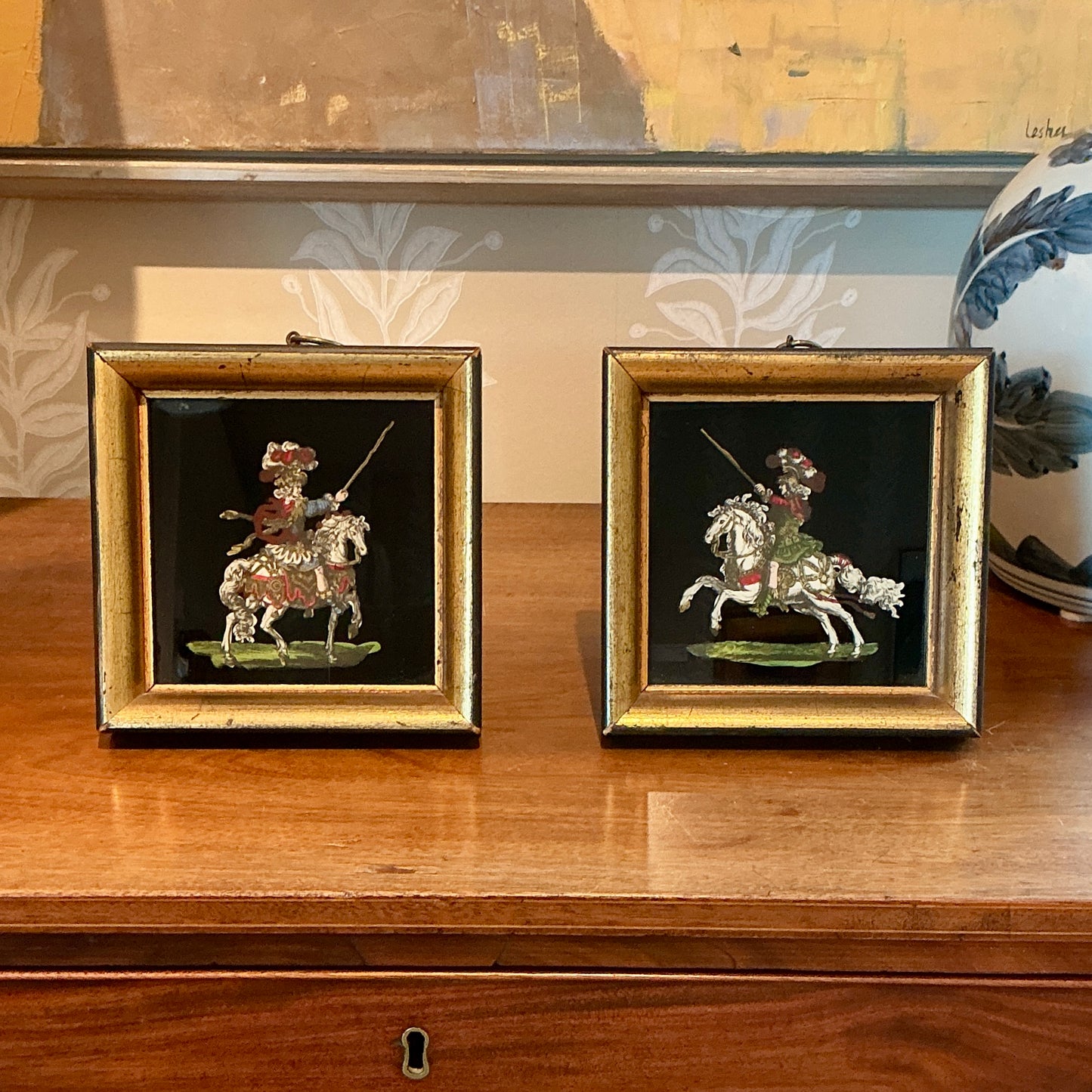 Pair of Reverse Painted Knights on Horseback Portraits in Gold Frames