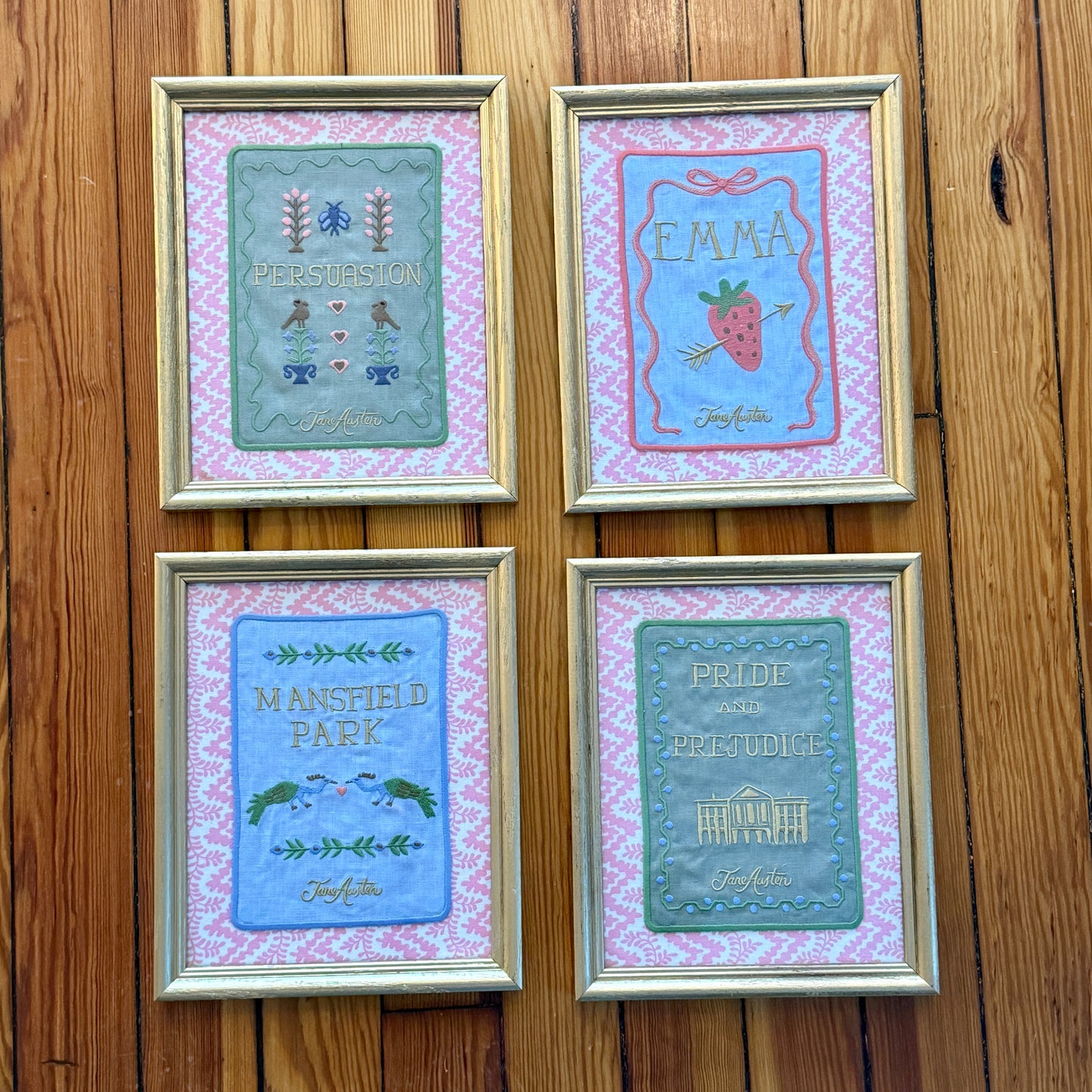 Jane Austen Novels Set of Four Emroidered Linen Books on Pink Cyrus Clark Fabric in Gold Frames