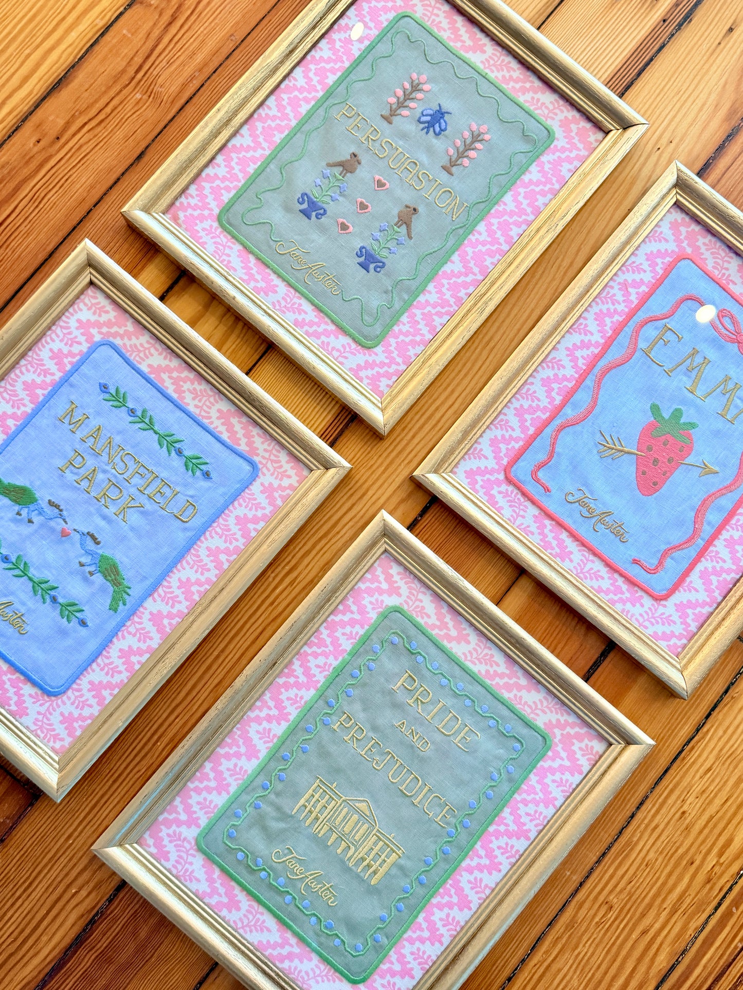 Jane Austen Novels Set of Four Emroidered Linen Books on Pink Cyrus Clark Fabric in Gold Frames