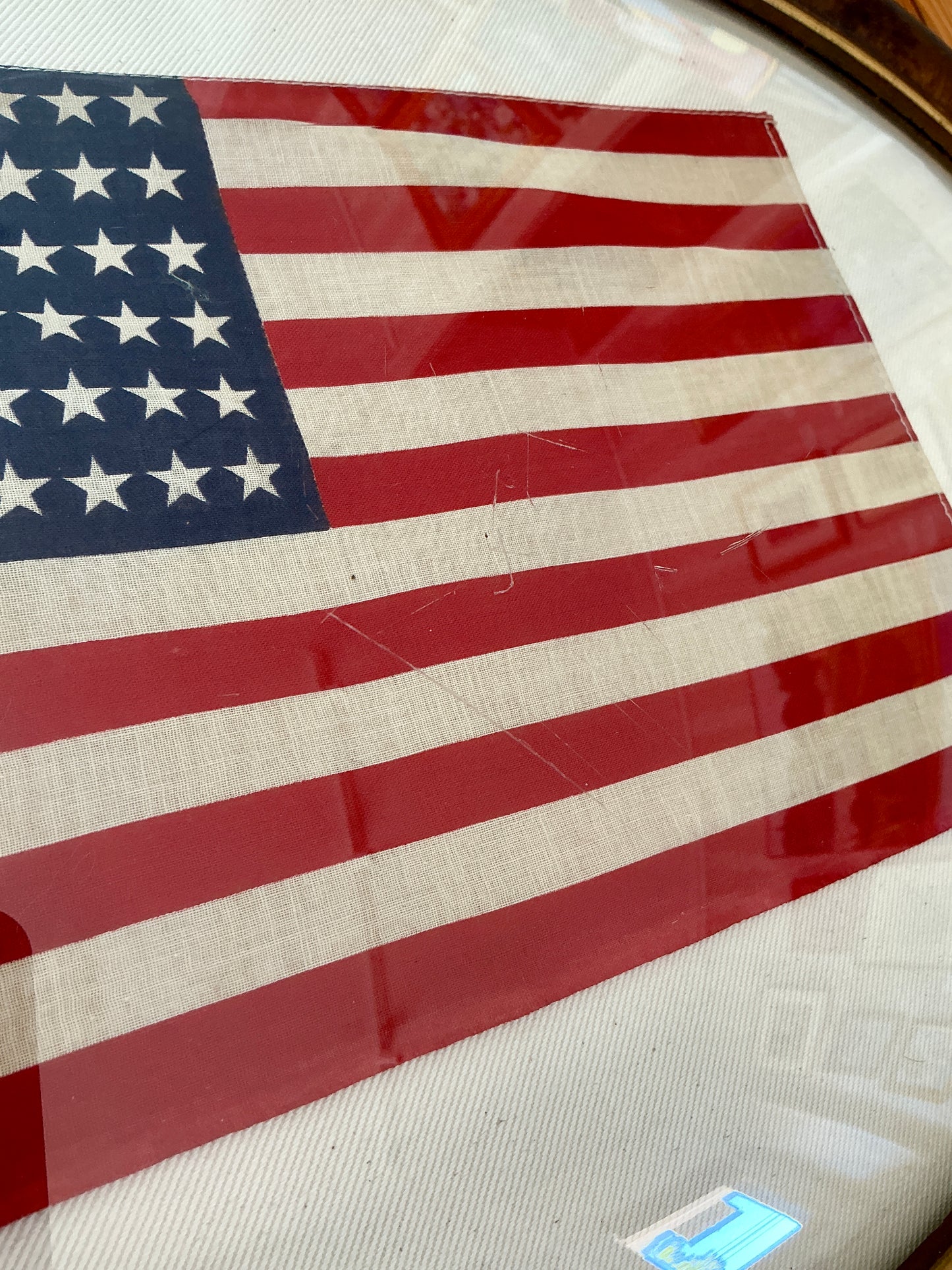 Vintage 48 Star American Flag on Sail Cloth in 1930s Oval Wood and Gilded Frame under Convex Glass
