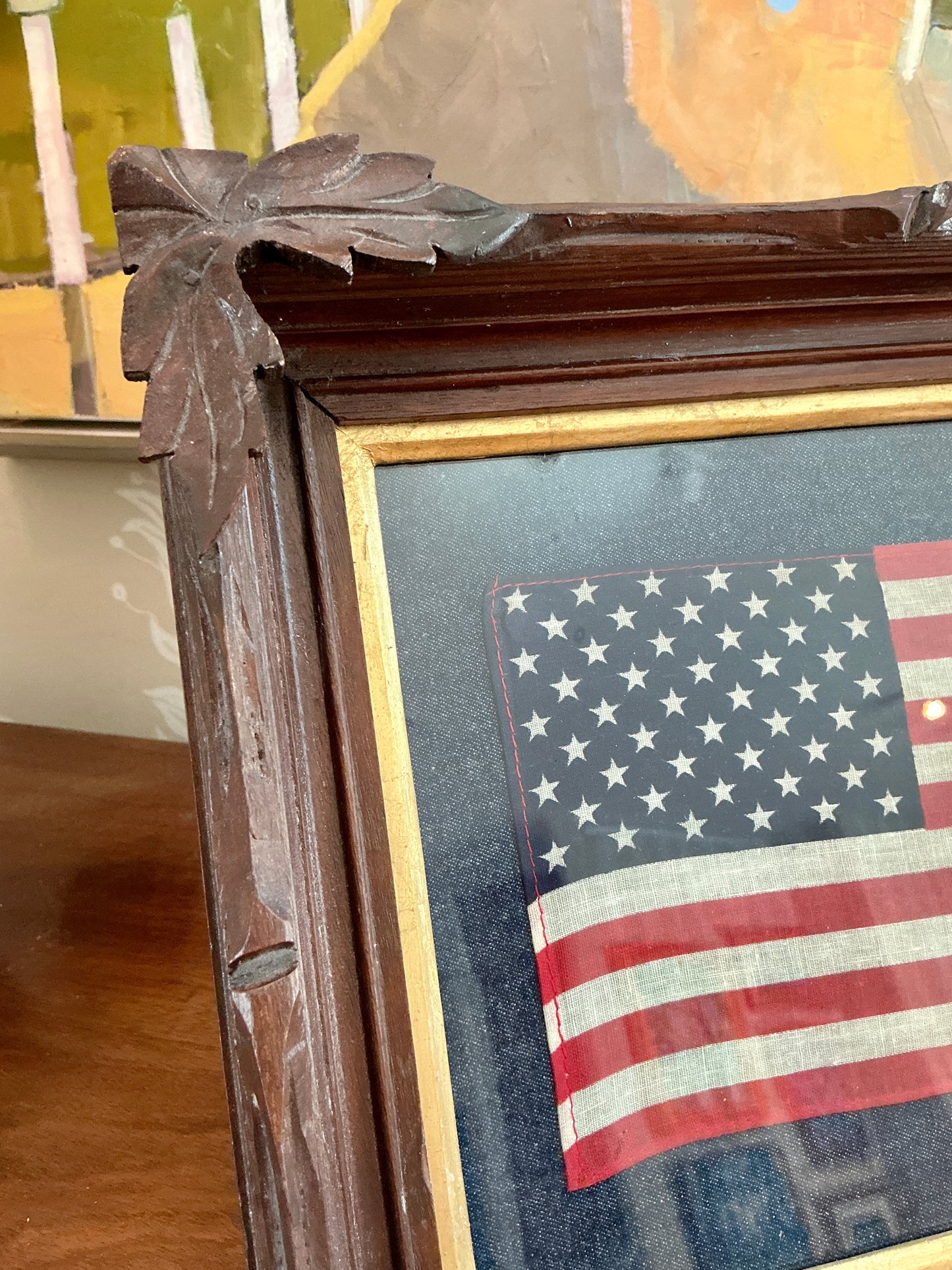 Vintage 50 Star American Flag on Dark Chambray in 19th Century Walnut Carved Leaf Frame