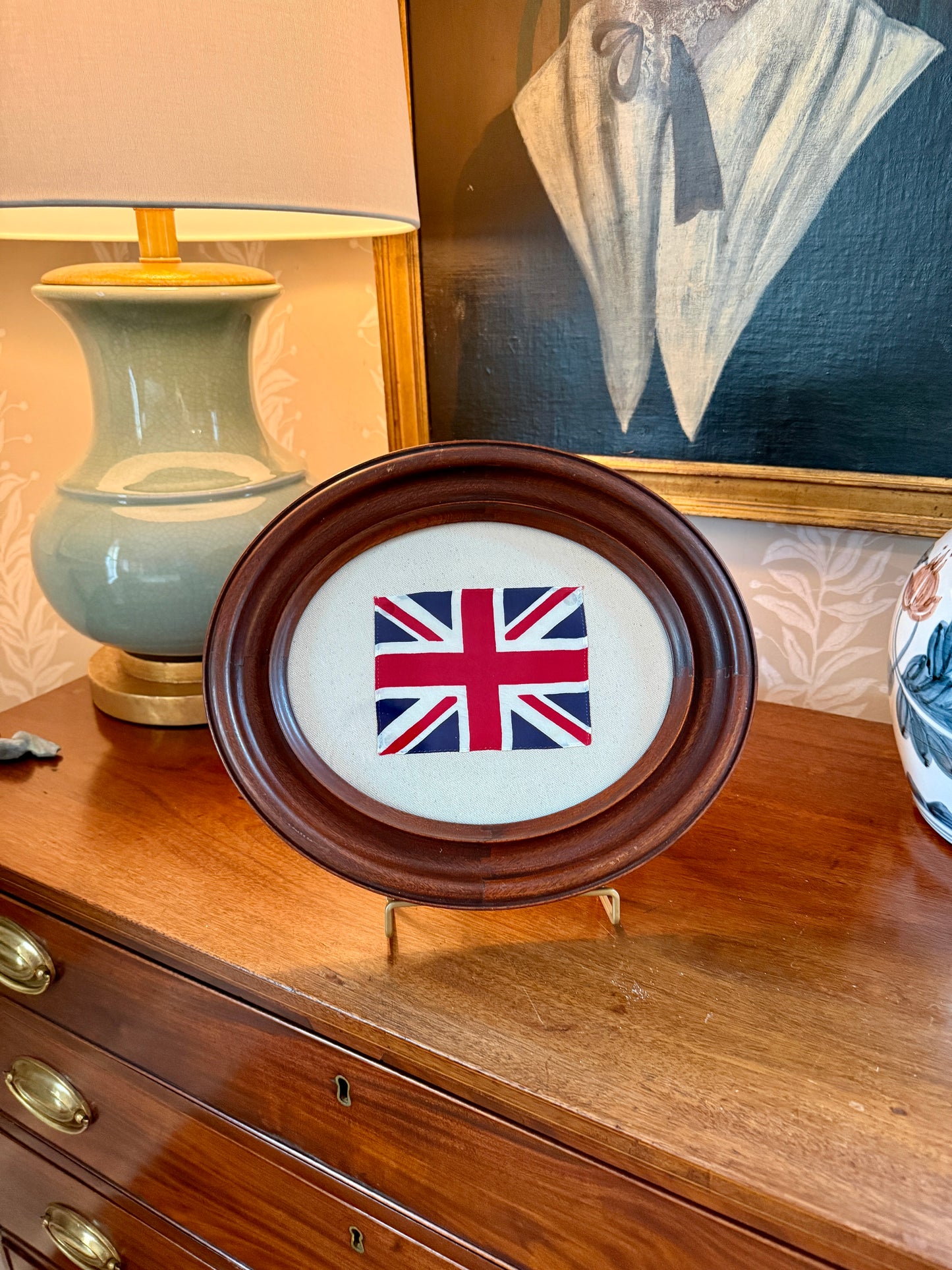 Union Jack Parade Flag on Ivory Twill in Antique Oval Wood Frame