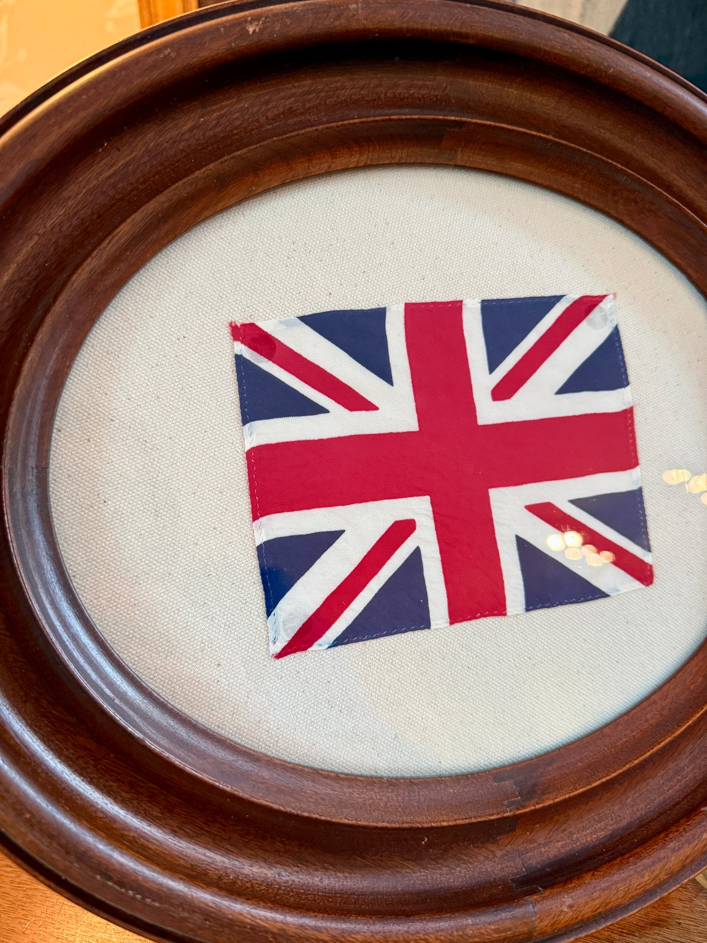 Union Jack Parade Flag on Ivory Twill in Antique Oval Wood Frame