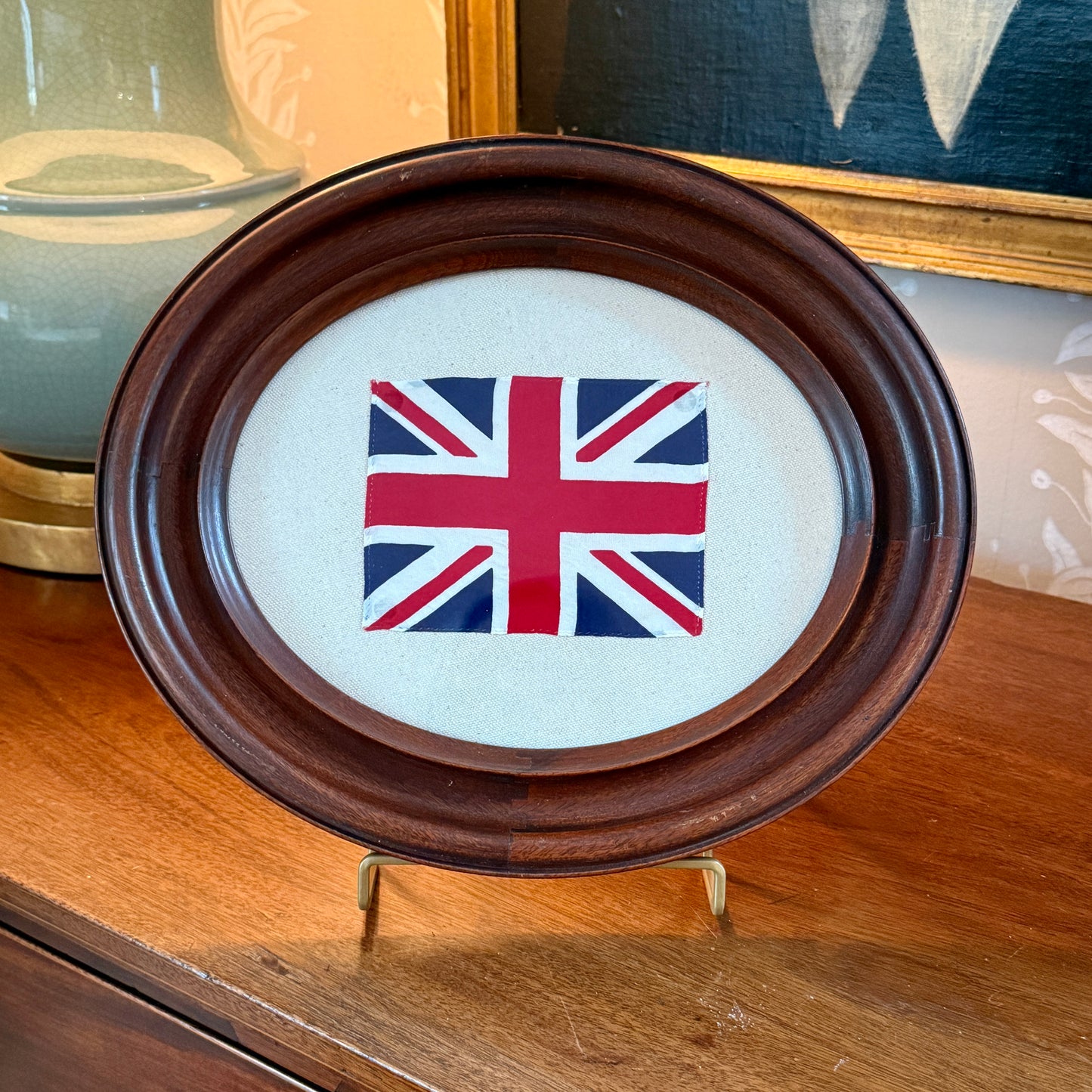 Union Jack Parade Flag on Ivory Twill in Antique Oval Wood Frame