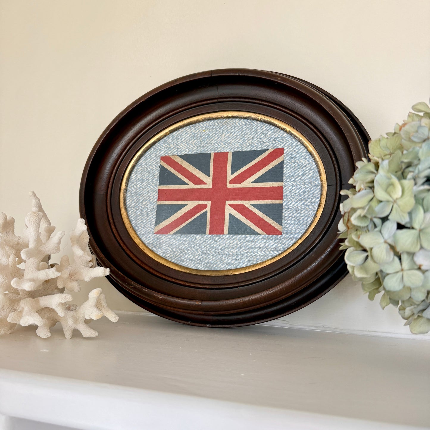 Vintage Union Jack British Parade Flag on Light Blue Herringbone in Antique Oval Wood Frame