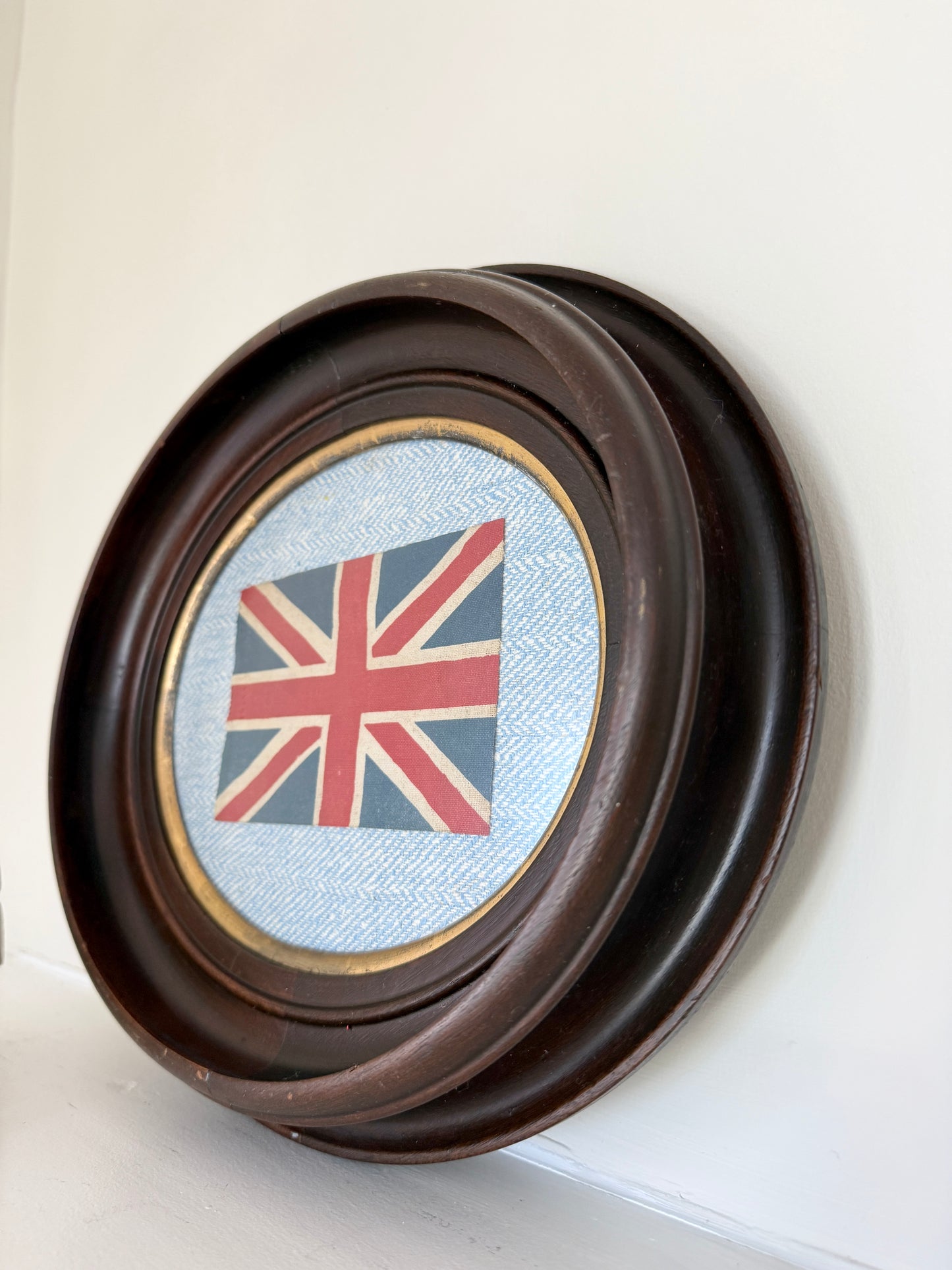Vintage Union Jack British Parade Flag on Light Blue Herringbone in Antique Oval Wood Frame