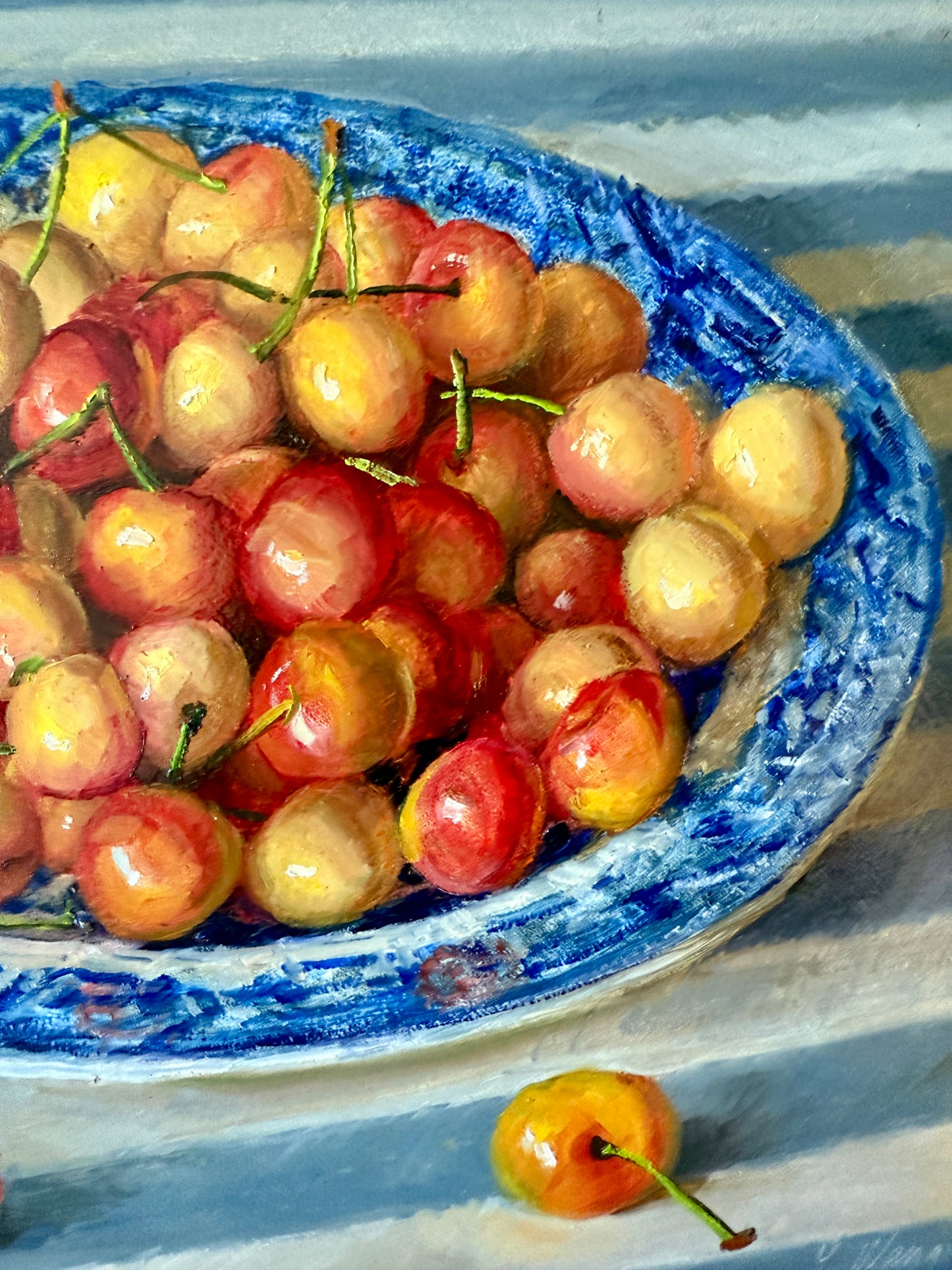 Rainier Cherries in Blue and White Bowl on Striped Tablecloth in Gold Frame