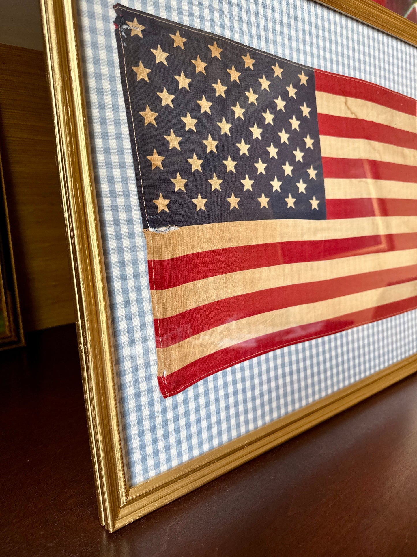 Vintage 50 Staggered Star American Flag on Light Blue Gingham Fabric in Gold Frame