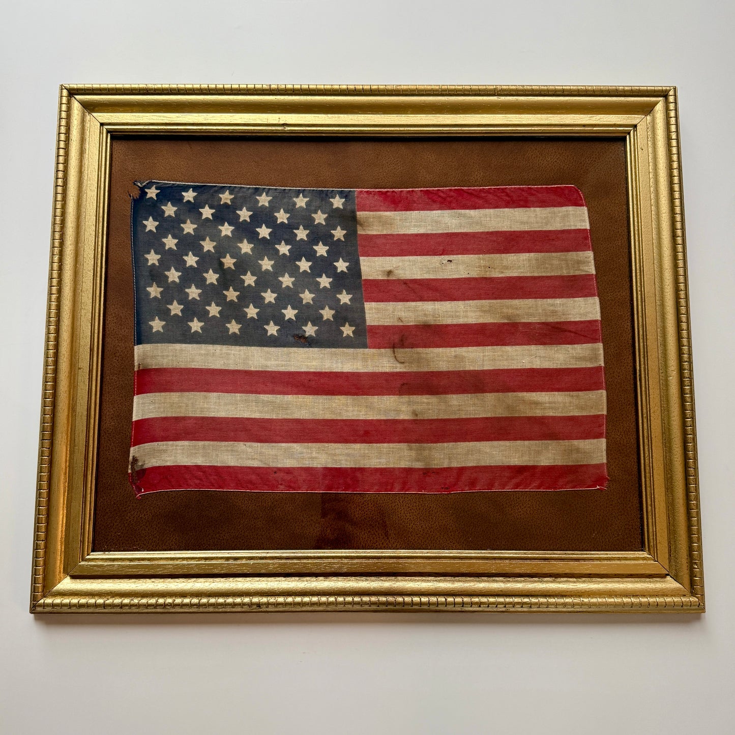 Vintage 50 Star American Flag on Faux Leather in Gold Frame