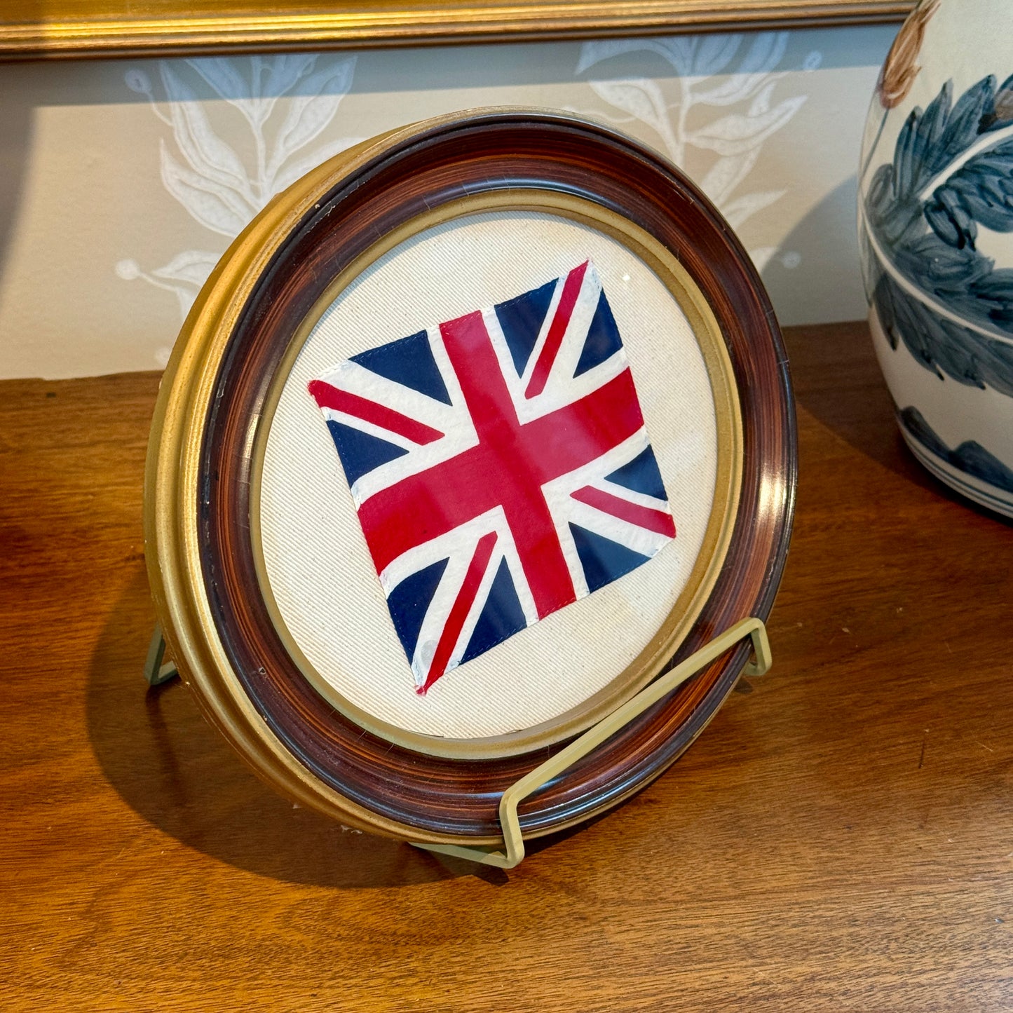Union Jack Parade Flag on Ivory Twill in Antique Oval Wood Frame