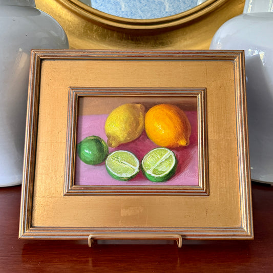 Lemons and Limes on Pink Cloth Realist Still Life Oil Painting in Gold Frame