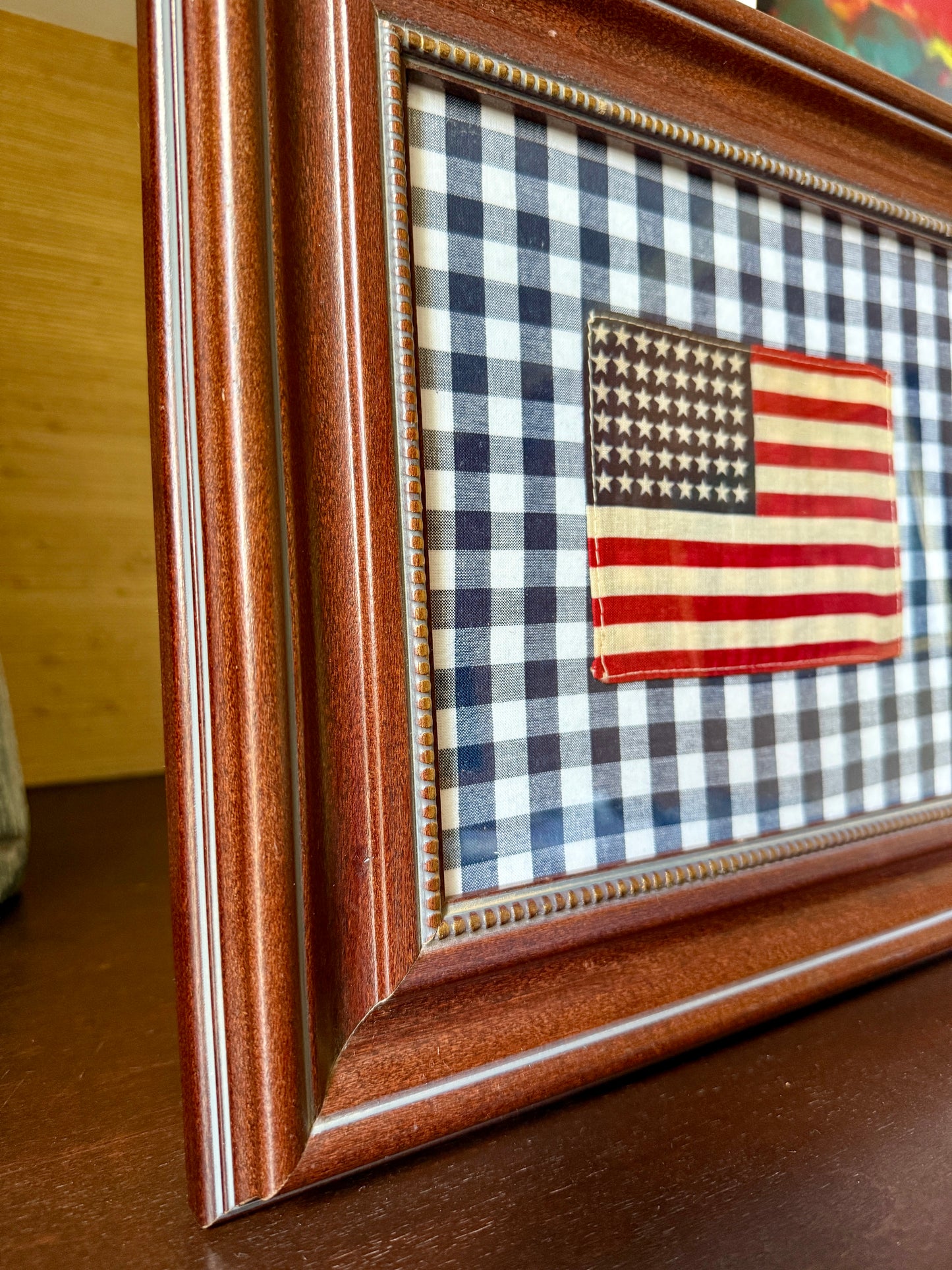 48 Star American Parade Flag on Navy Blue Gingham in Wood Beaded Frame
