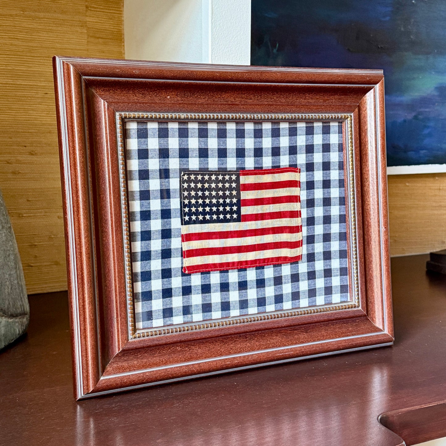 48 Star American Parade Flag on Navy Blue Gingham in Wood Beaded Frame