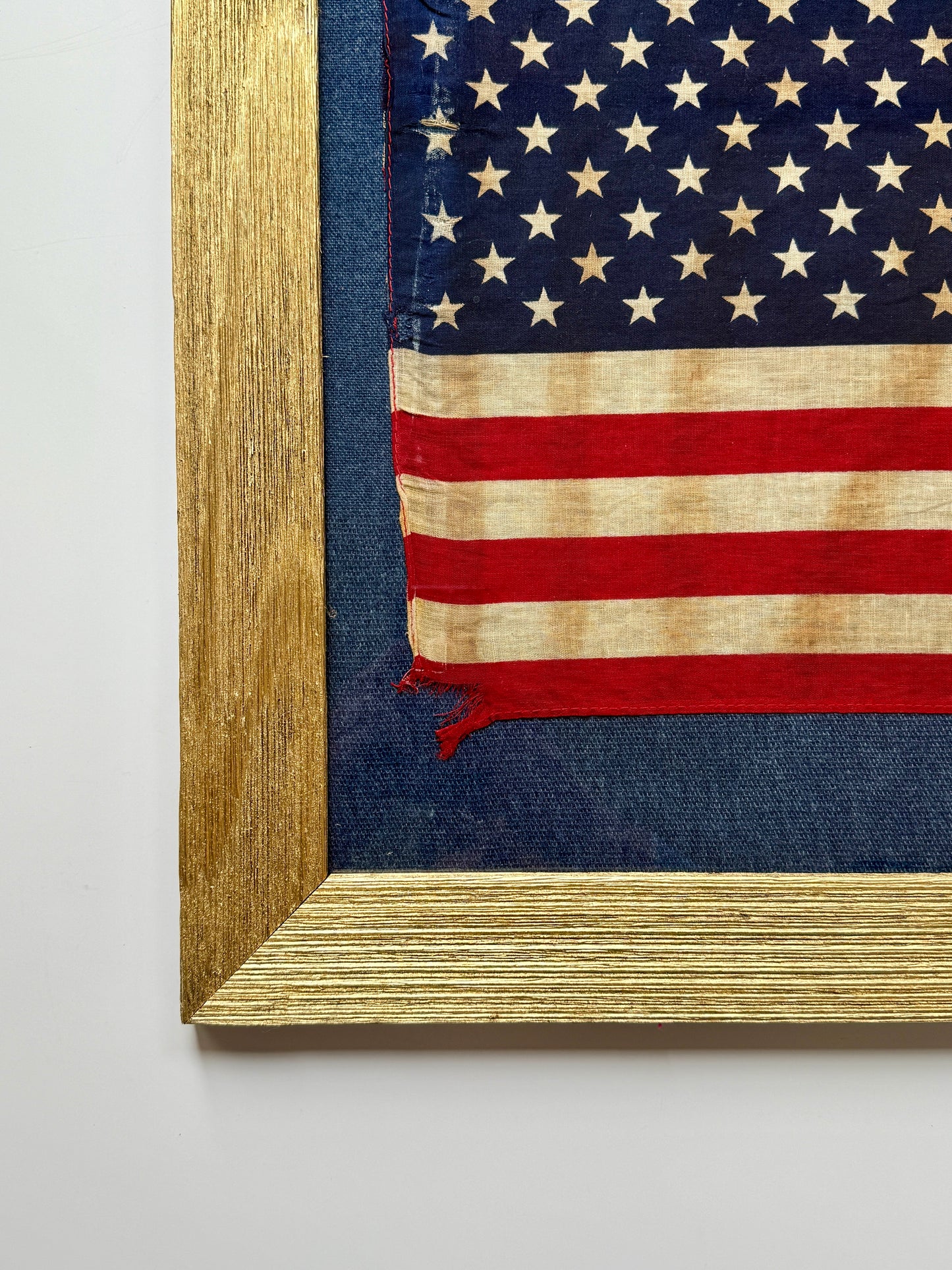 Vintage 50 Staggered Star American Flag on Blue Canvas in Gold Barnwood Frame