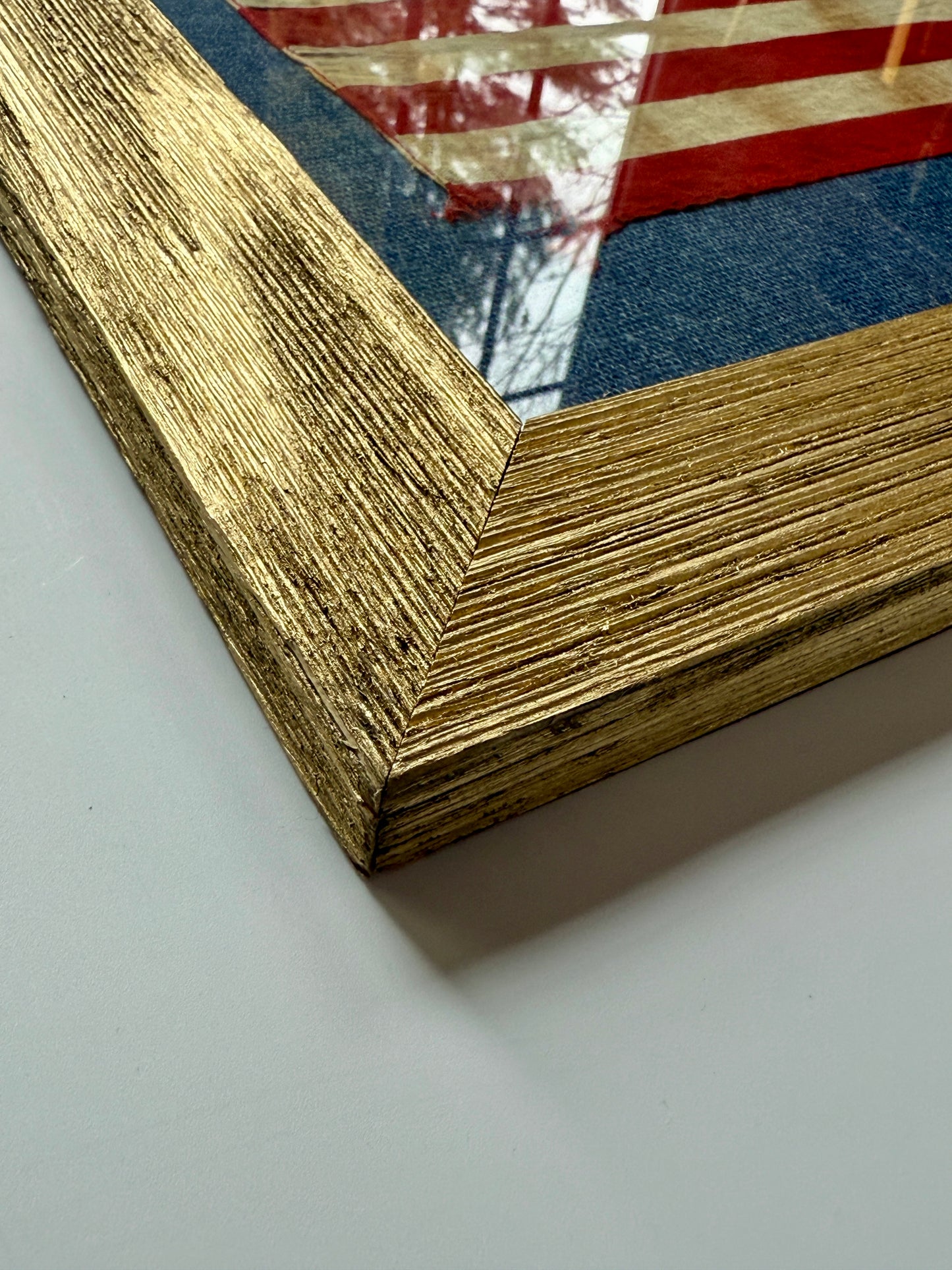 Vintage 50 Staggered Star American Flag on Blue Canvas in Gold Barnwood Frame
