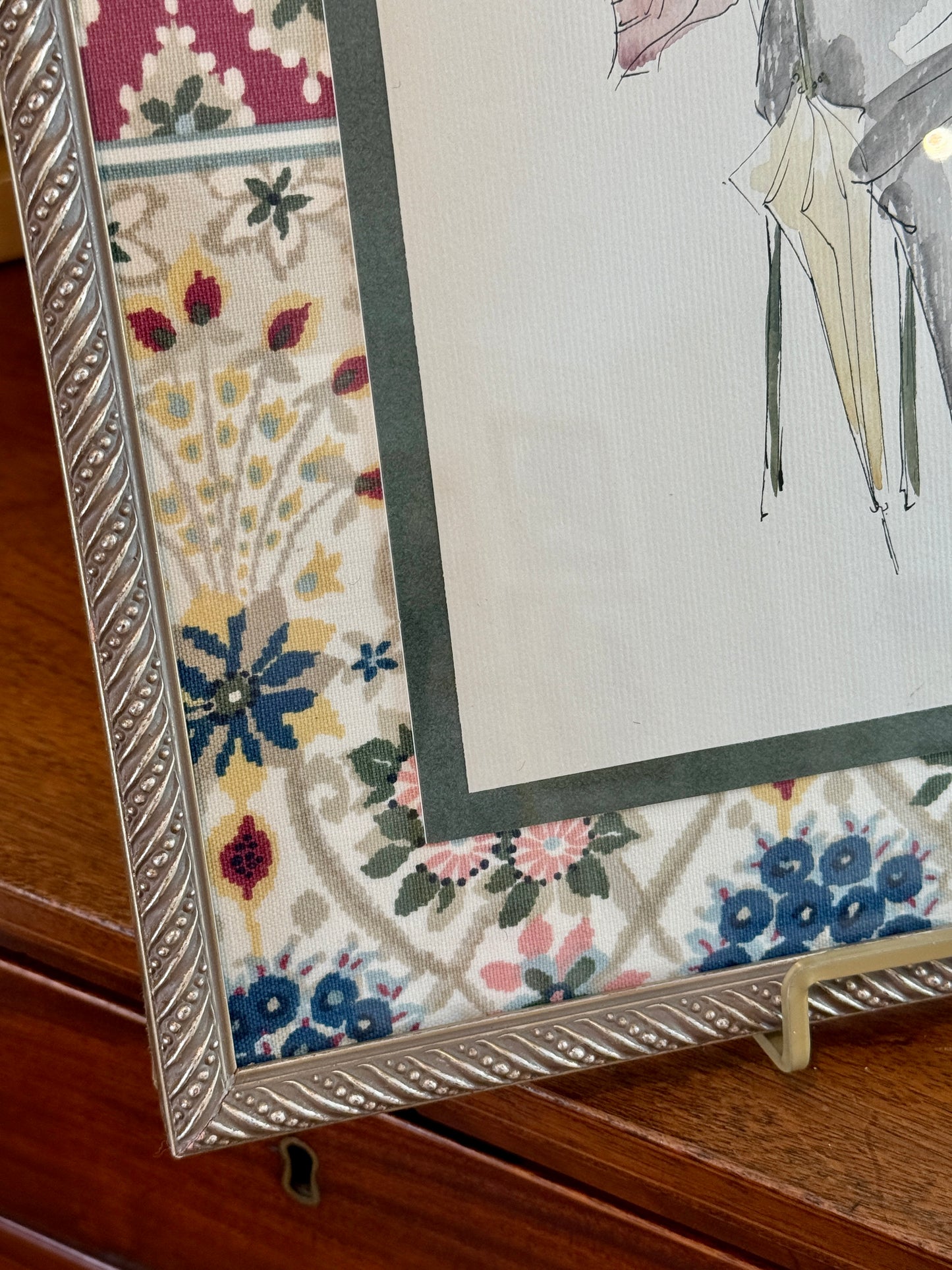 Catherine Figart Vogue Watercolor Fashion Illustration on Duralee Tilton Fenwick Fabric in Dark Gold Frame