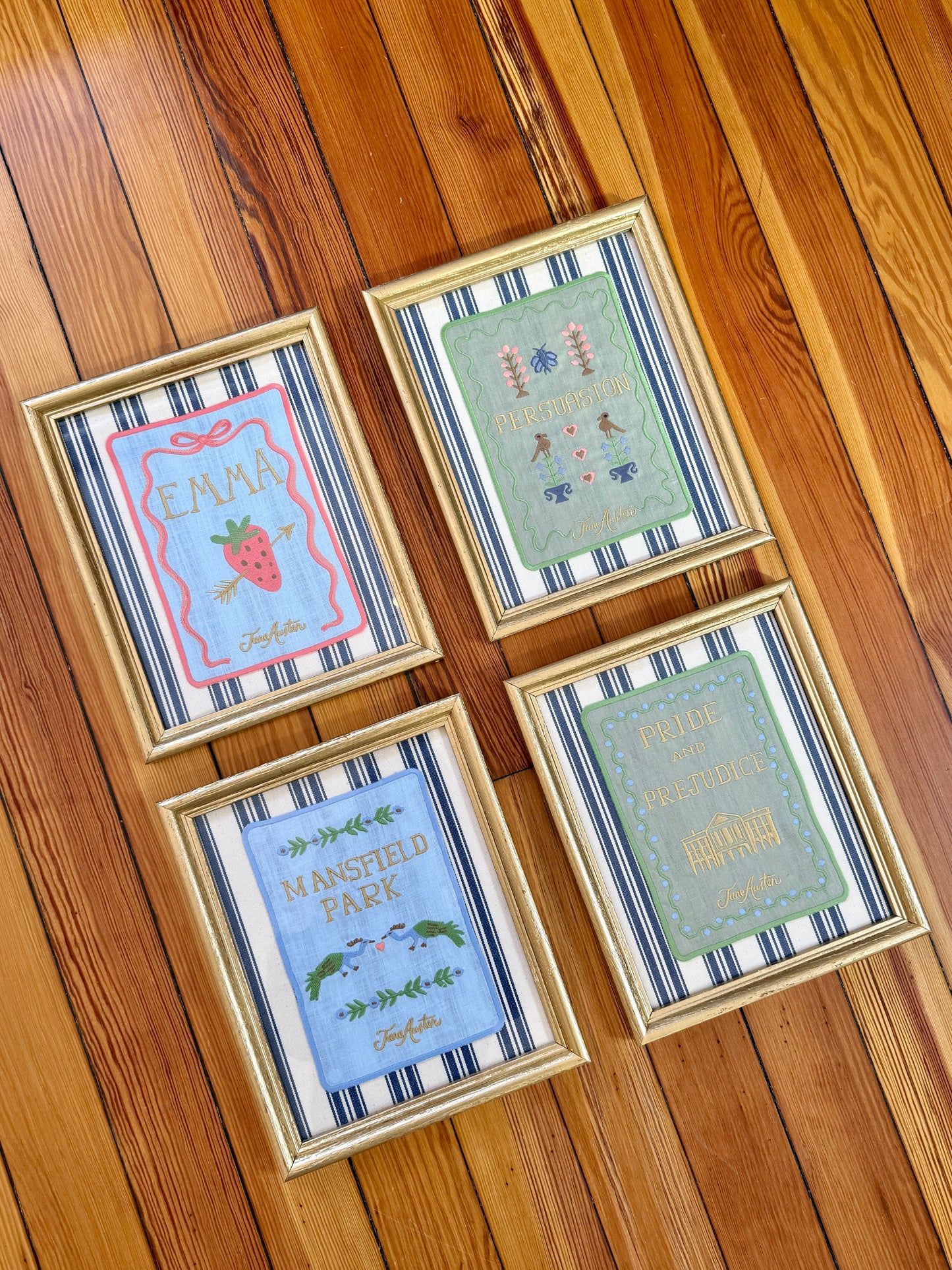 Jane Austen Novels Set of Four Emroidered Linen Books on Ivory and Navy Stripes in Gold Frames