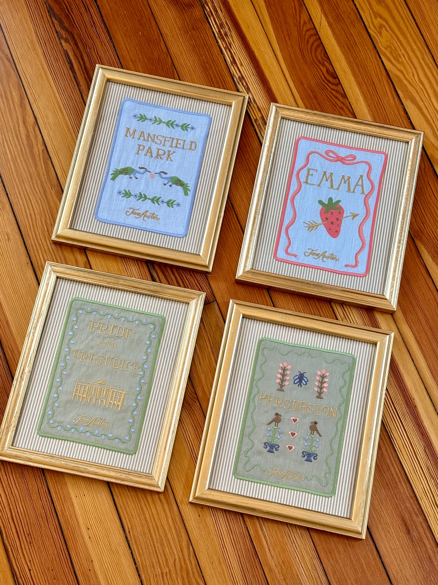 Jane Austen Novels Set of Four Emroidered Linen Books on Neutral Ticking Stripes in Gold Frames