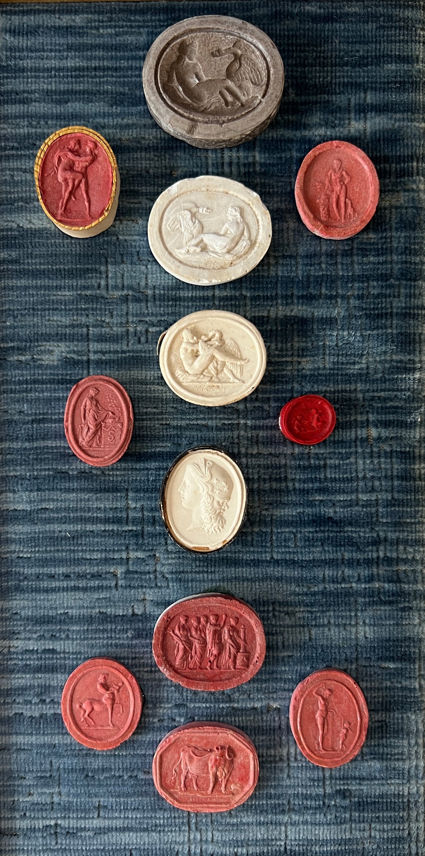 Collection of 19th Century Grand Tour Plaster and Red Sulfur Intaglios on Blue Velvet Gold Frame
